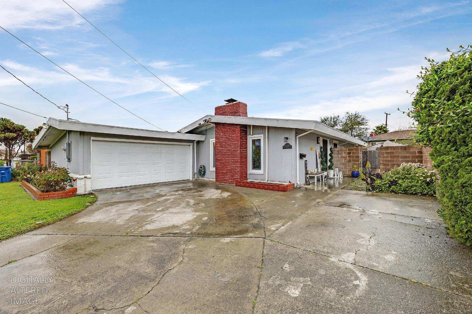 1481 Rieger Avenue Hayward, CA 94544 - Photo 4 of 34 a view of a house with a yard and garage