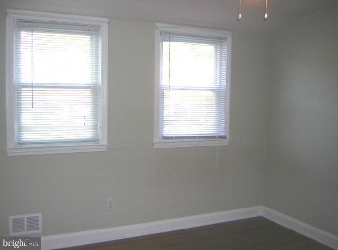1677 Thetford Road Towson, MD 21286 - Photo 11 of 18 an empty room with a window