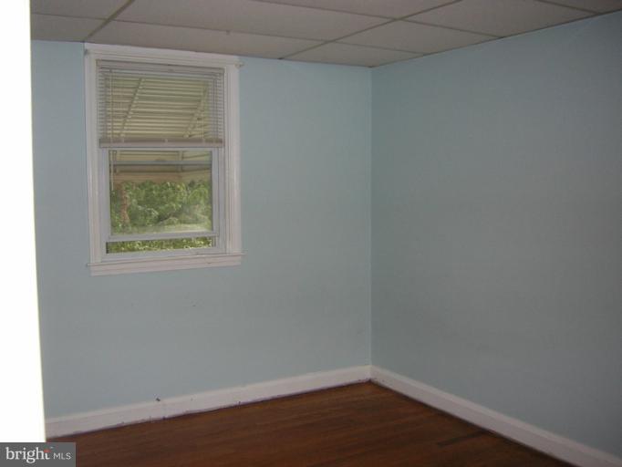 1677 Thetford Road Towson, MD 21286 - Photo 14 of 18 an empty room with a window