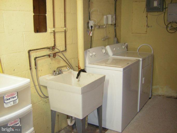 1677 Thetford Road Towson, MD 21286 - Photo 18 of 18 a bathroom with a sink and a mirror
