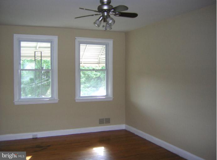 1677 Thetford Road Towson, MD 21286 - Photo 6 of 18 an empty room with a window