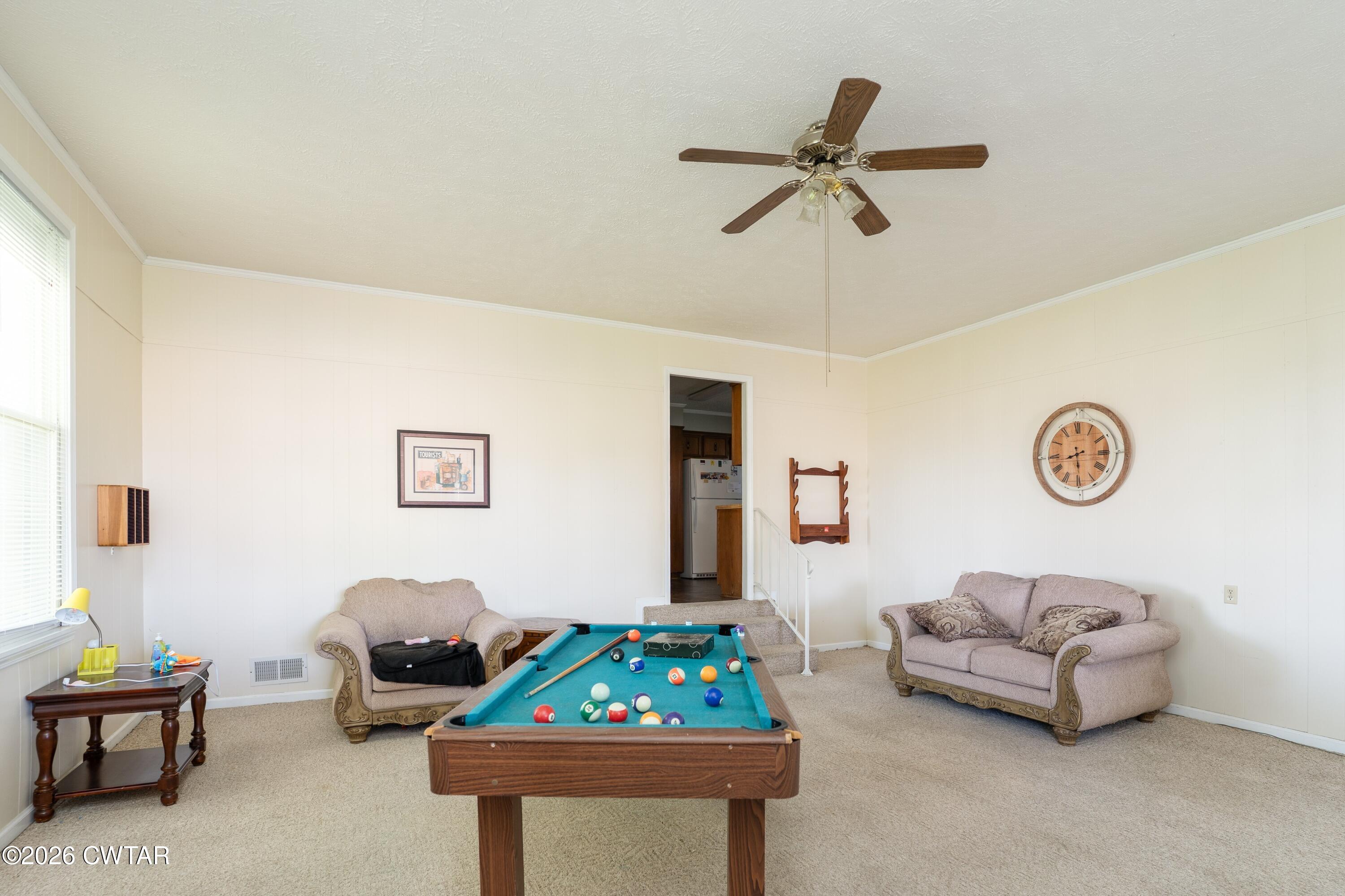 1053 Ashport Road Jackson, TN 38305 - Photo 11 of 42 a living room with furniture and a window