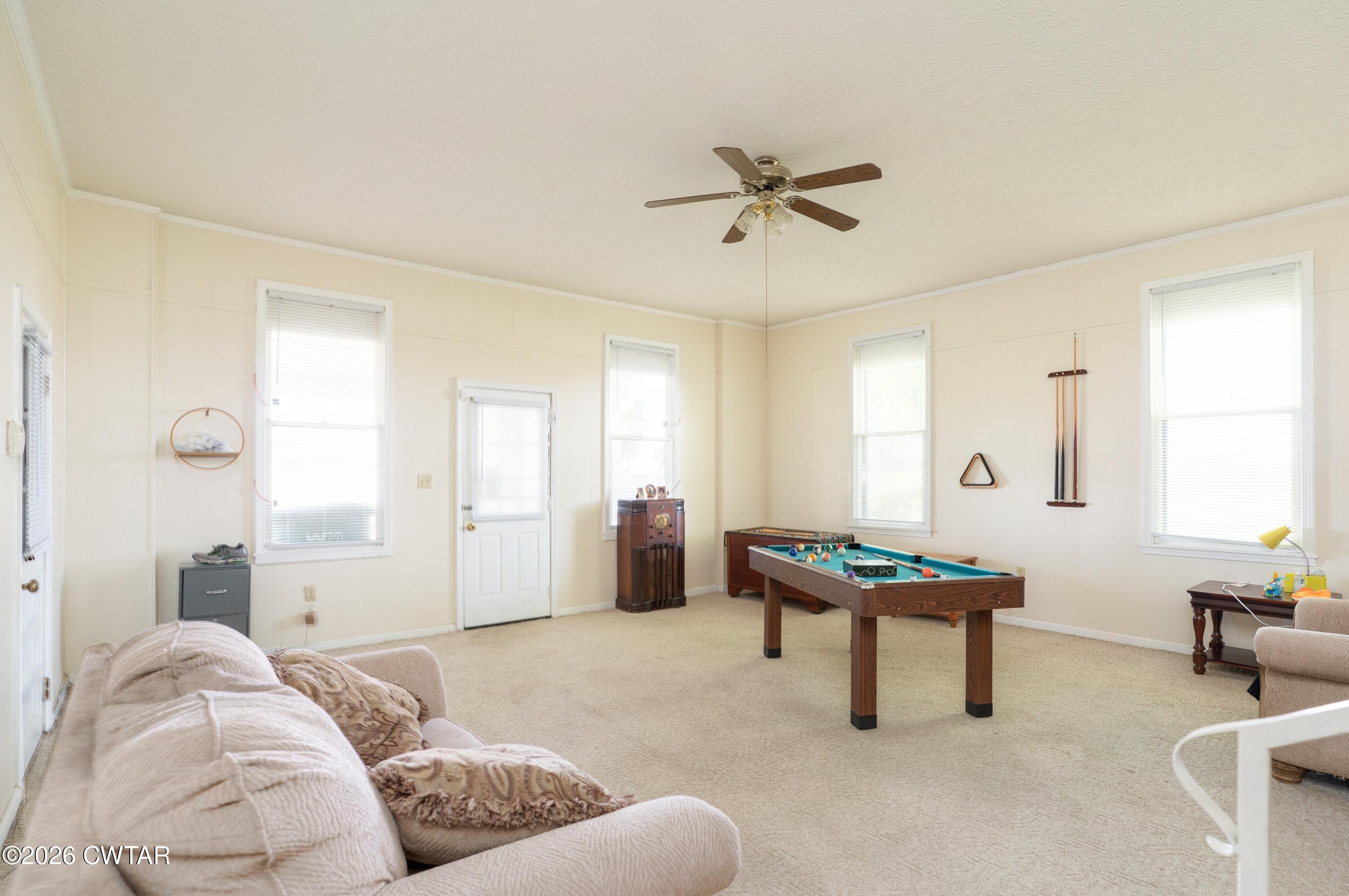 1053 Ashport Road Jackson, TN 38305 - Photo 12 of 42 a bedroom with furniture and a window