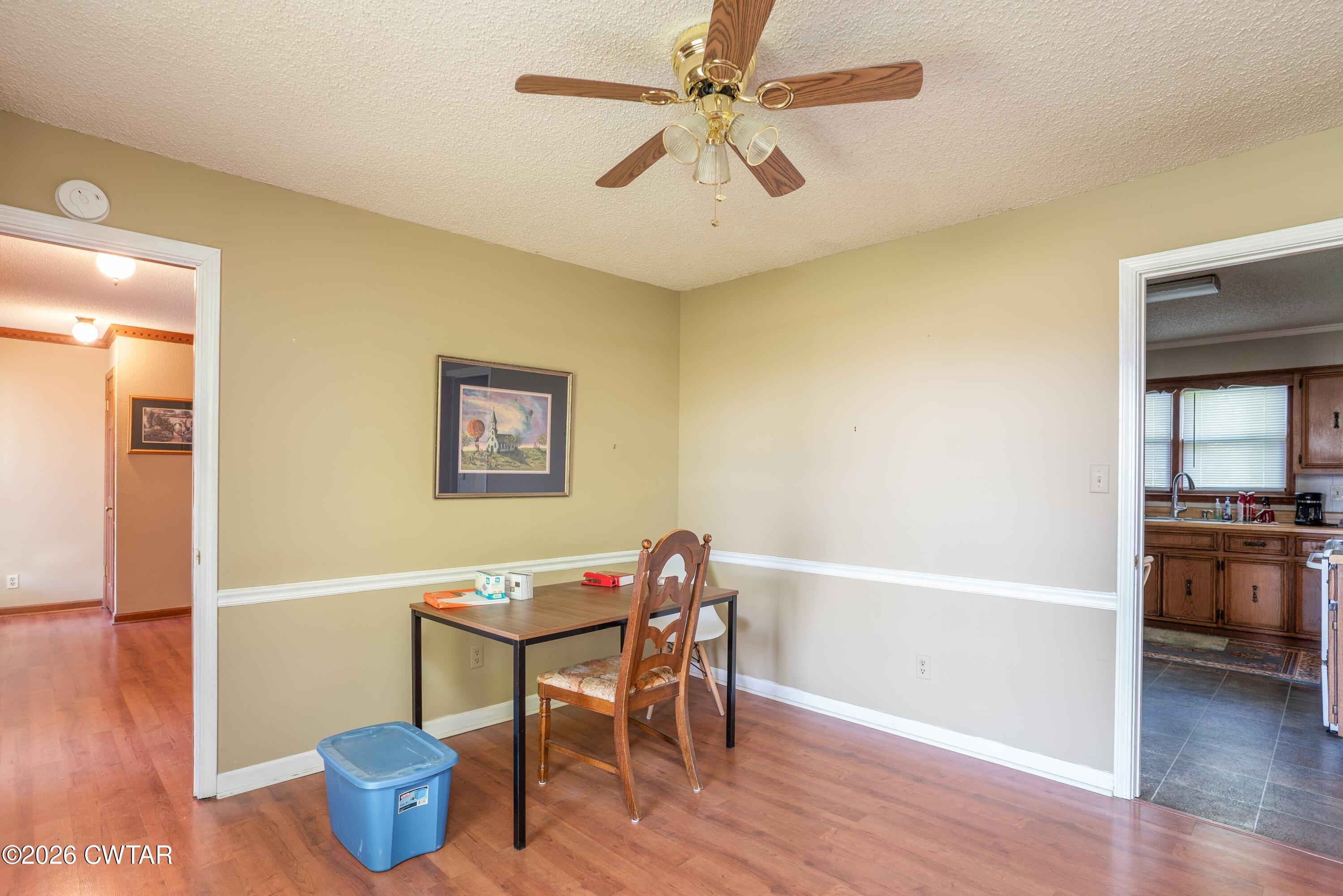 1053 Ashport Road Jackson, TN 38305 - Photo 14 of 42 a workspace with furniture and window