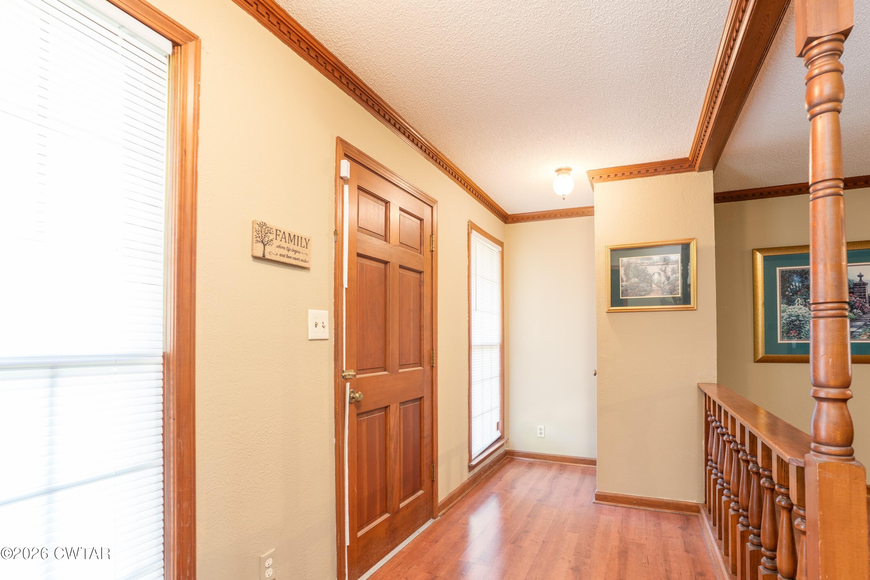 1053 Ashport Road Jackson, TN 38305 - Photo 16 of 42 a view of hallway with wooden floor