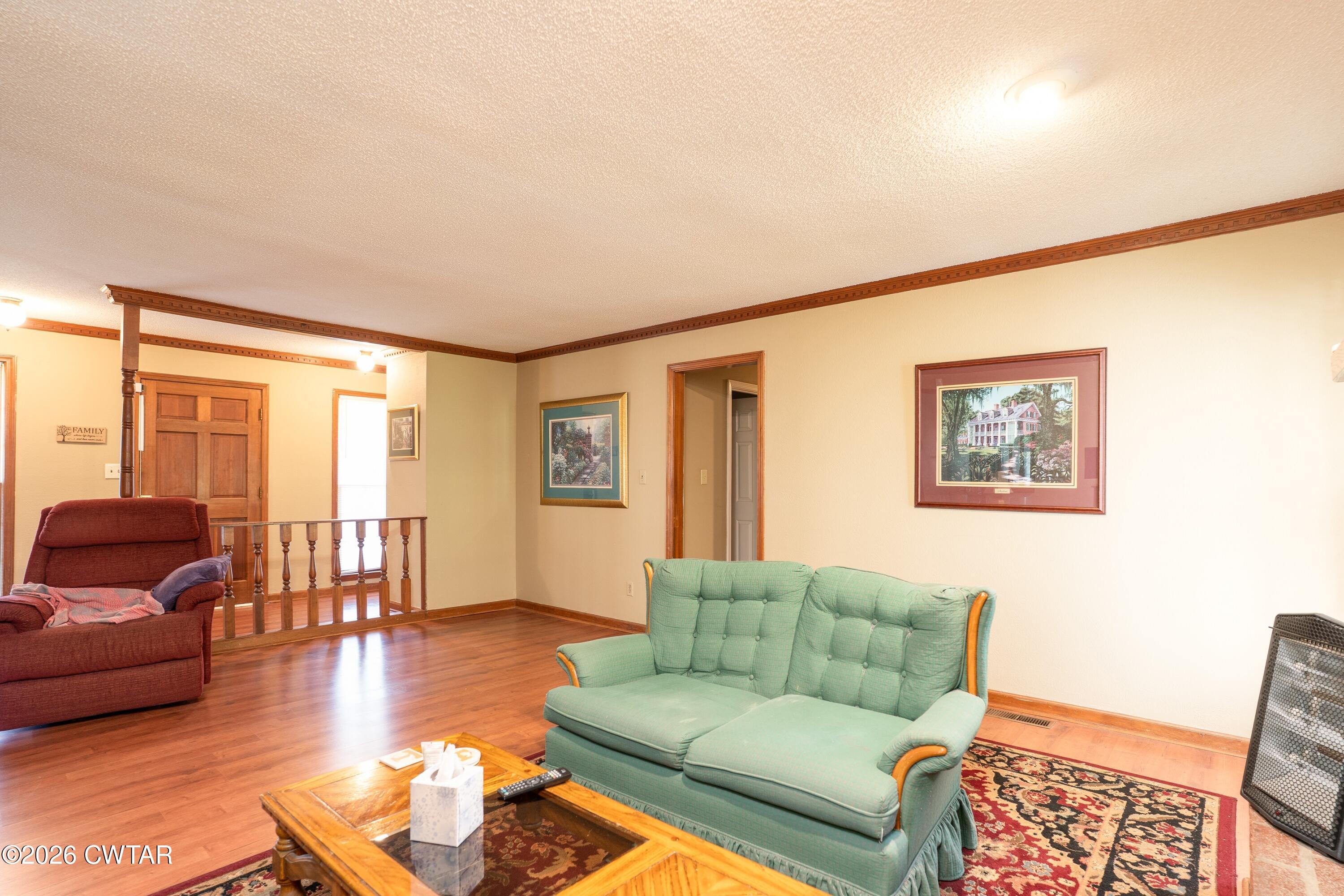1053 Ashport Road Jackson, TN 38305 - Photo 21 of 42 a living room with furniture and a window