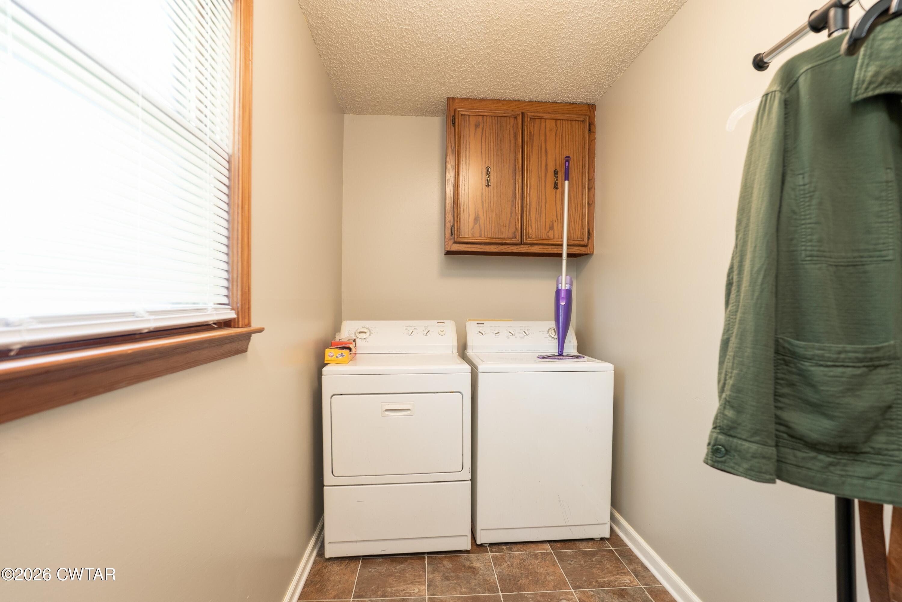 1053 Ashport Road Jackson, TN 38305 - Photo 28 of 42 a utility room with dryer and washer