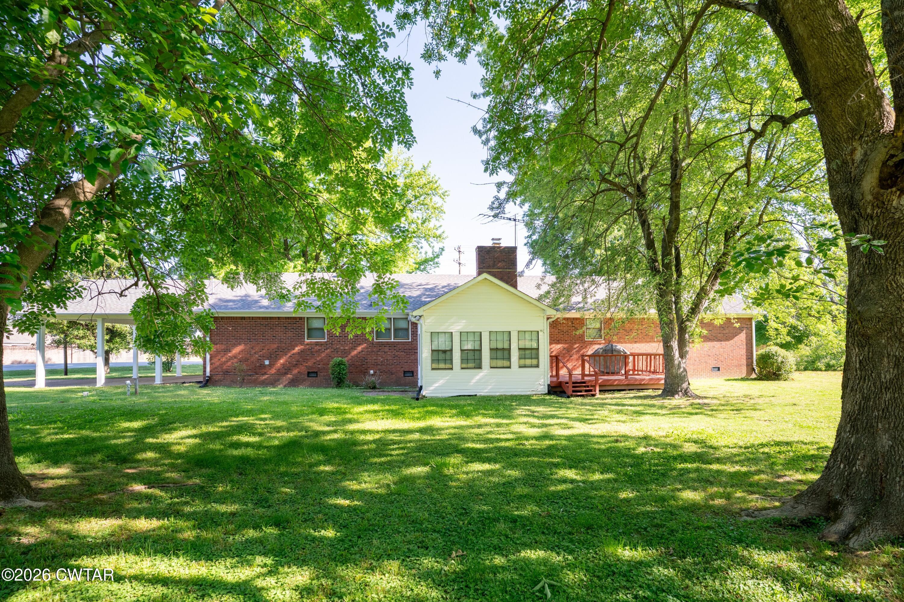 1053 Ashport Road Jackson, TN 38305 - Photo 3 of 42 a view of a house with a yard