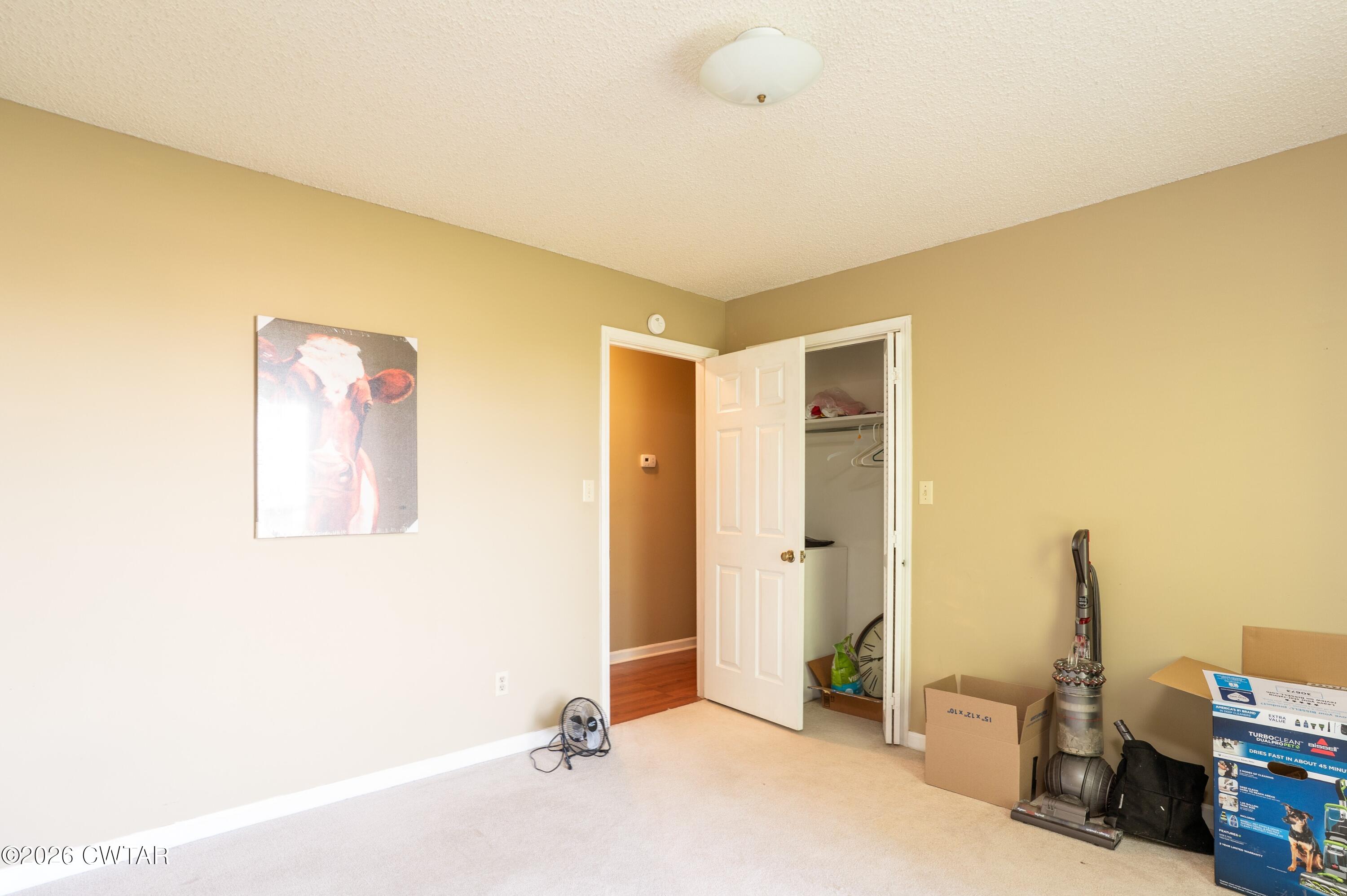 1053 Ashport Road Jackson, TN 38305 - Photo 32 of 42 a view of a bedroom with closet