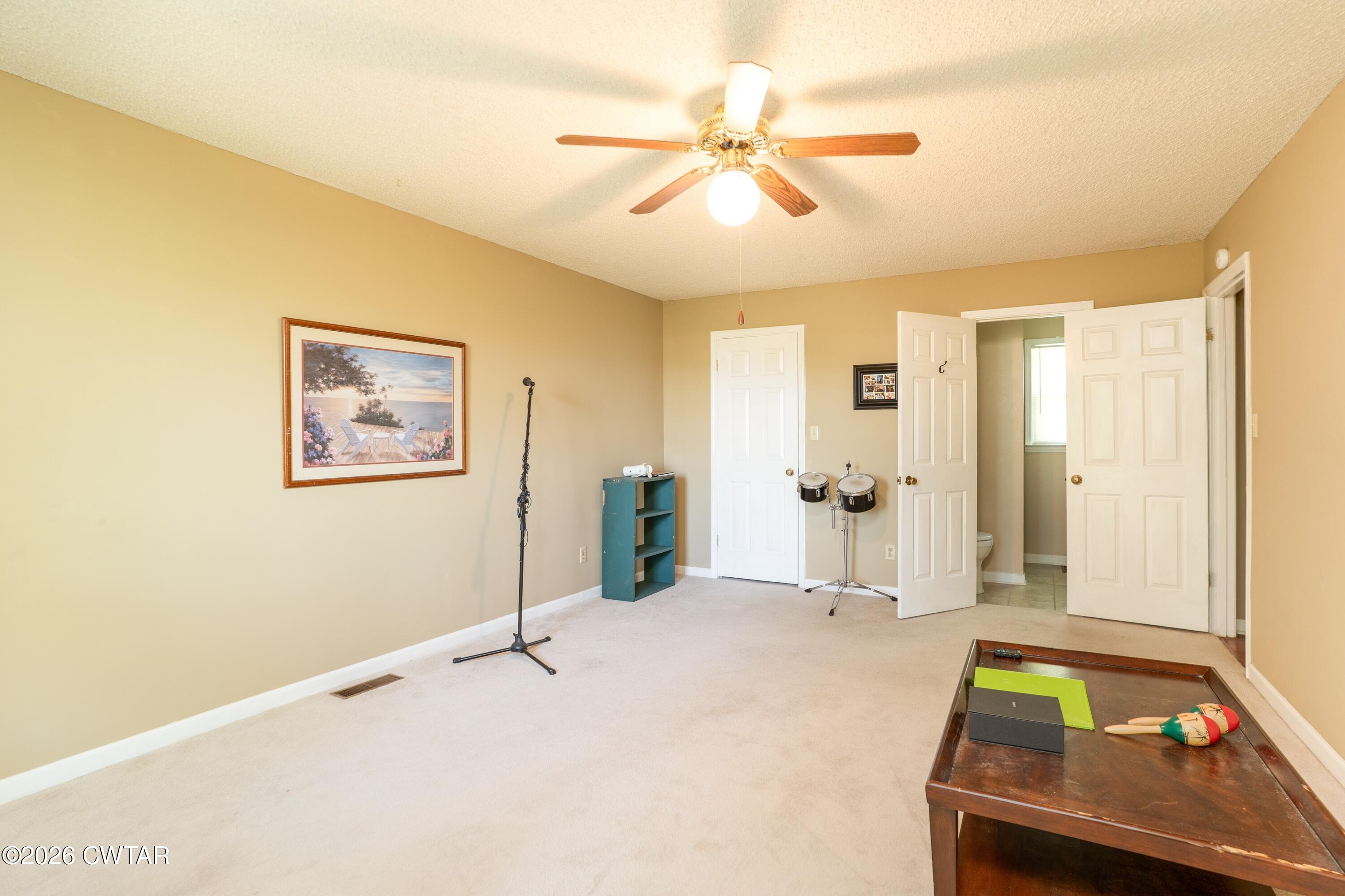 1053 Ashport Road Jackson, TN 38305 - Photo 39 of 42 a room with pool table and glass door
