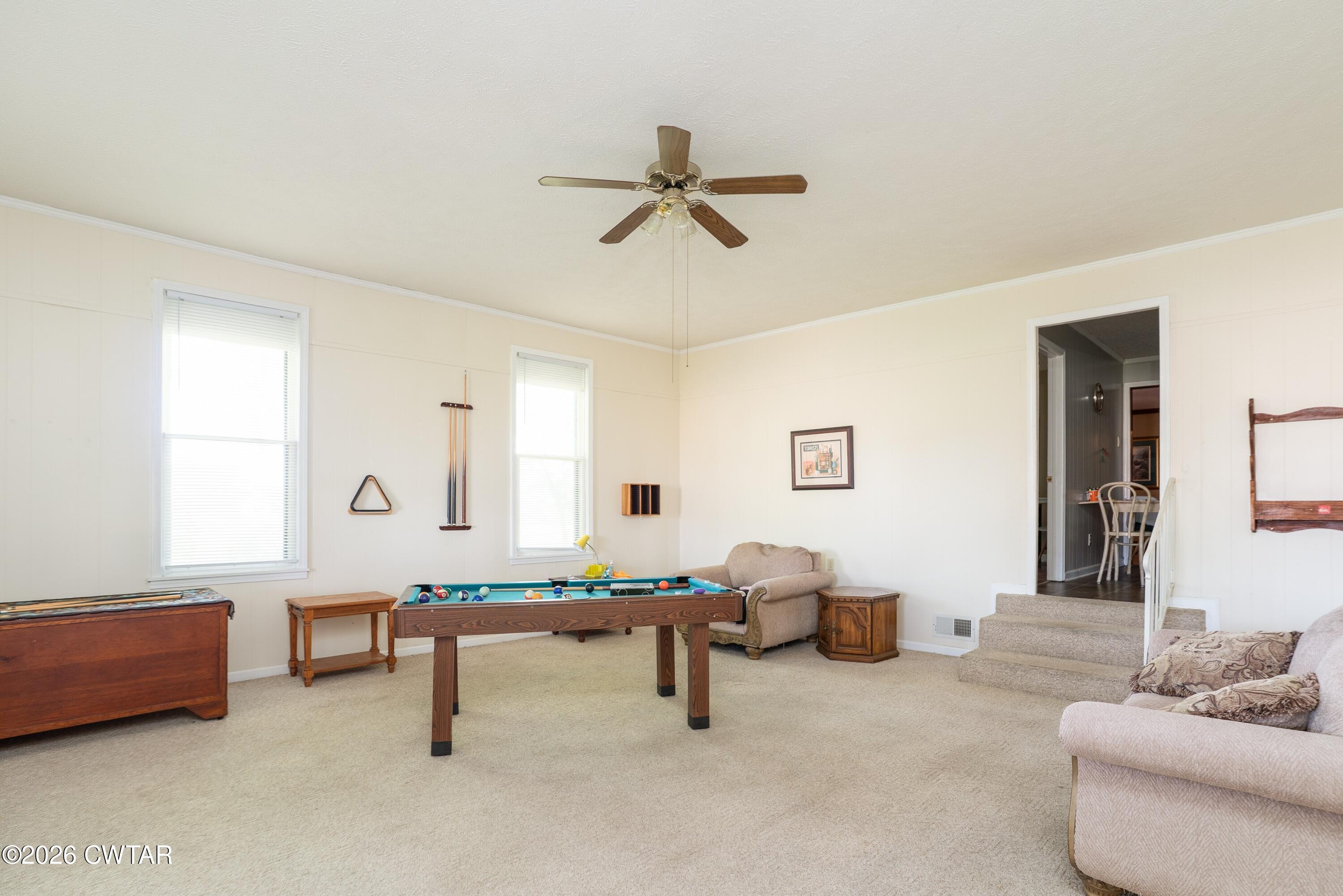 1053 Ashport Road Jackson, TN 38305 - Photo 10 of 42 a living room with furniture and a window