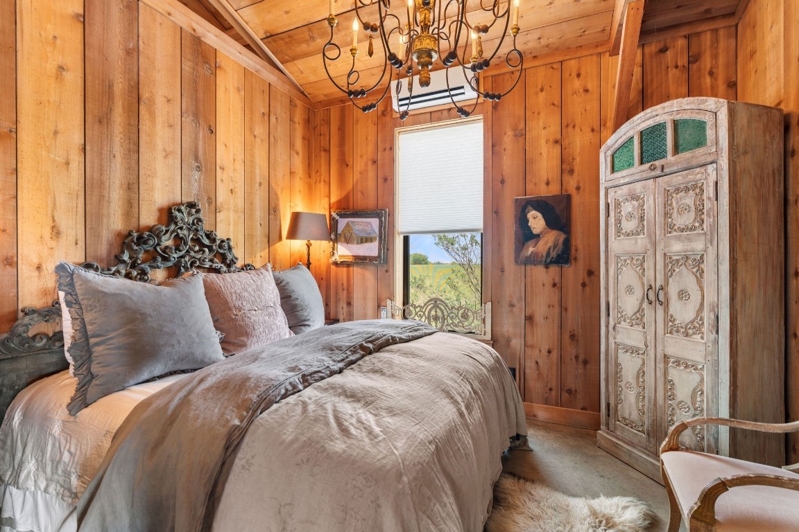 5025 Wickel Road Burton, TX 77835 - Photo 25 of 50 a bed sitting in a bedroom next to a window
