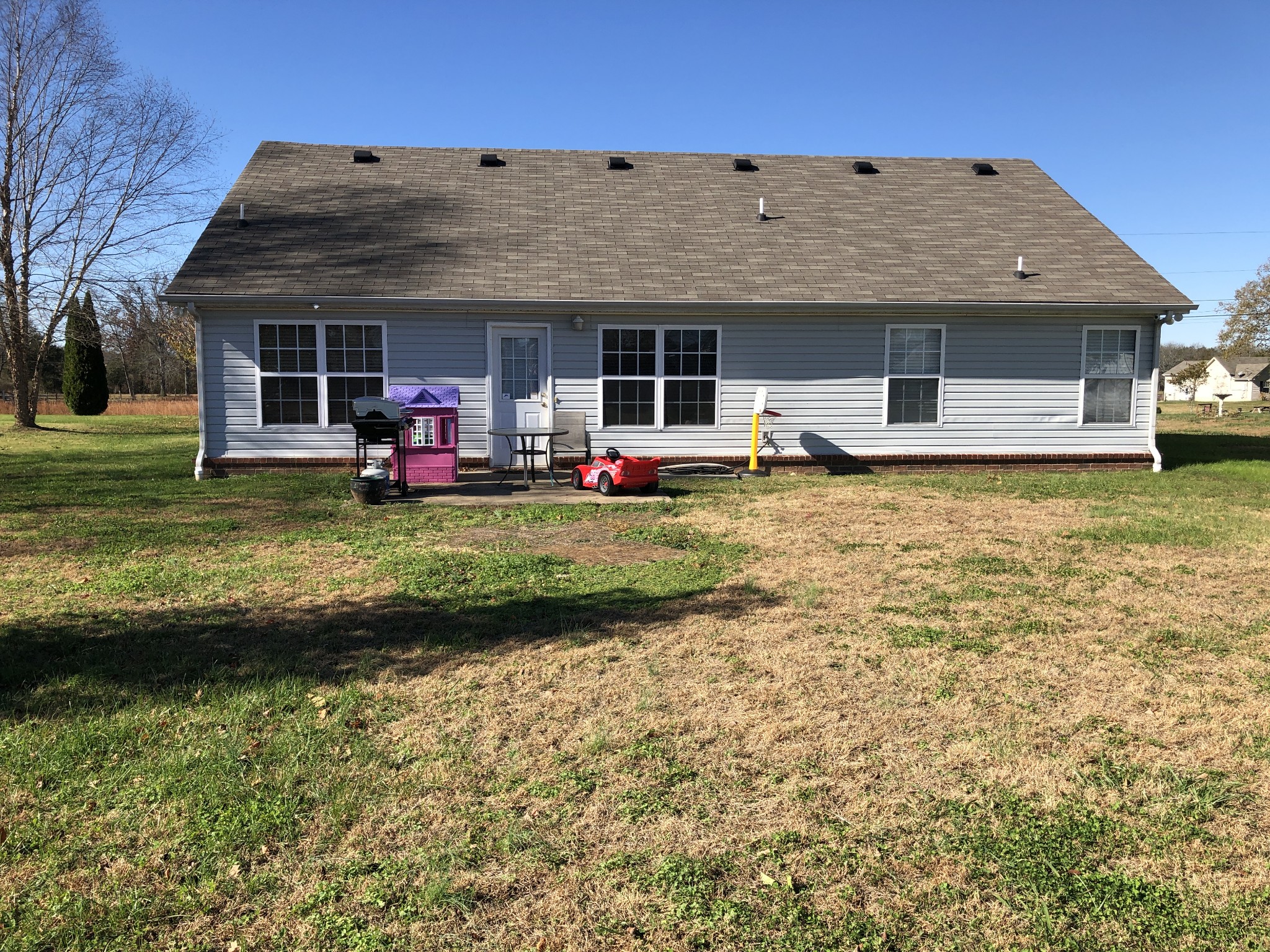 725 Crescent Road Murfreesboro, TN 37128 - Photo 5 of 16 a front view of a house with a garden and porch
