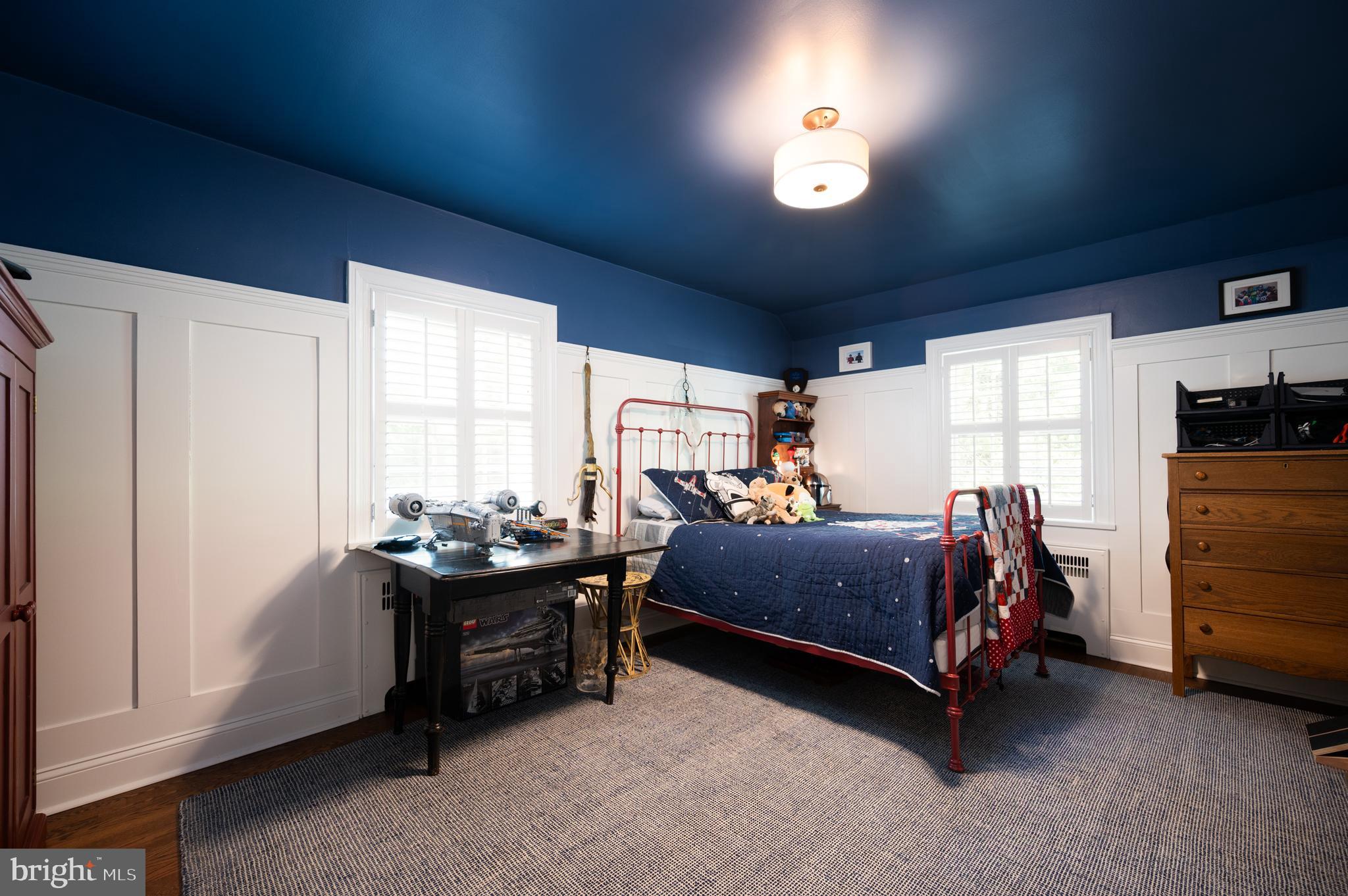 907 Overbrook Road Wilmington, DE 19807 - Photo 13 of 25 a bed room with furniture and a window