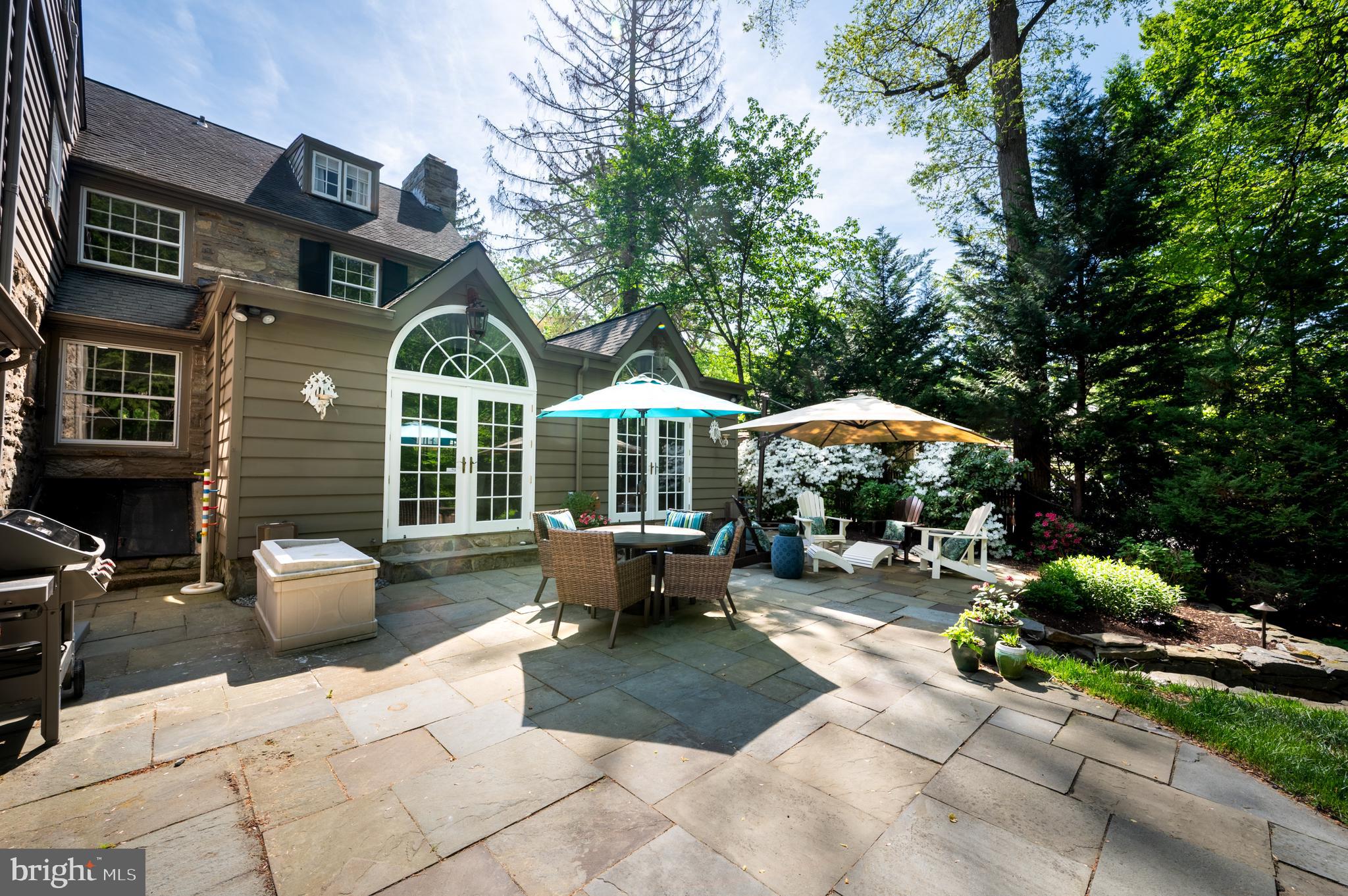 907 Overbrook Road Wilmington, DE 19807 - Photo 21 of 25 a building outdoor space with patio furniture and potted plants