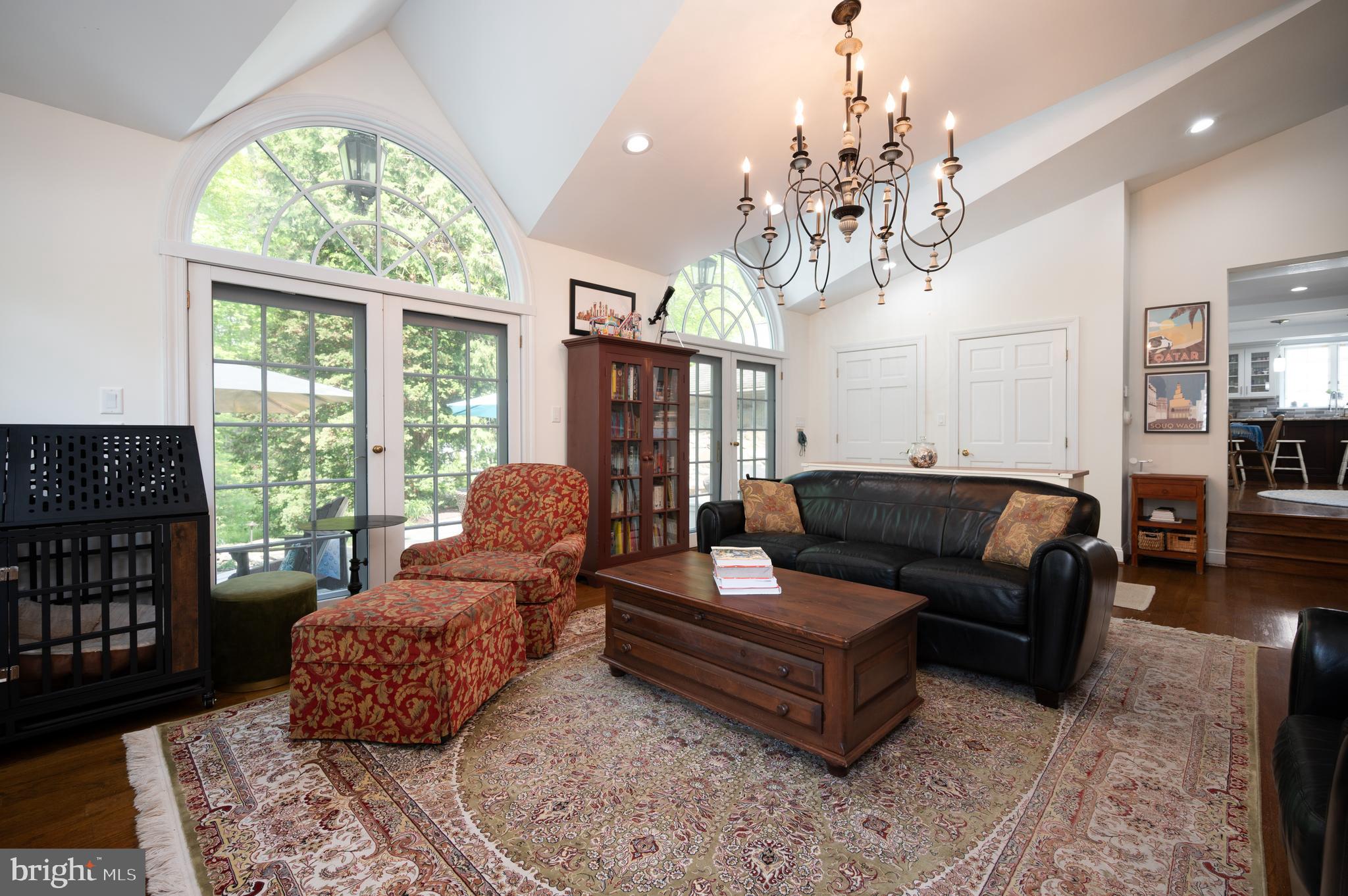 907 Overbrook Road Wilmington, DE 19807 - Photo 4 of 25 a living room with furniture and a chandelier