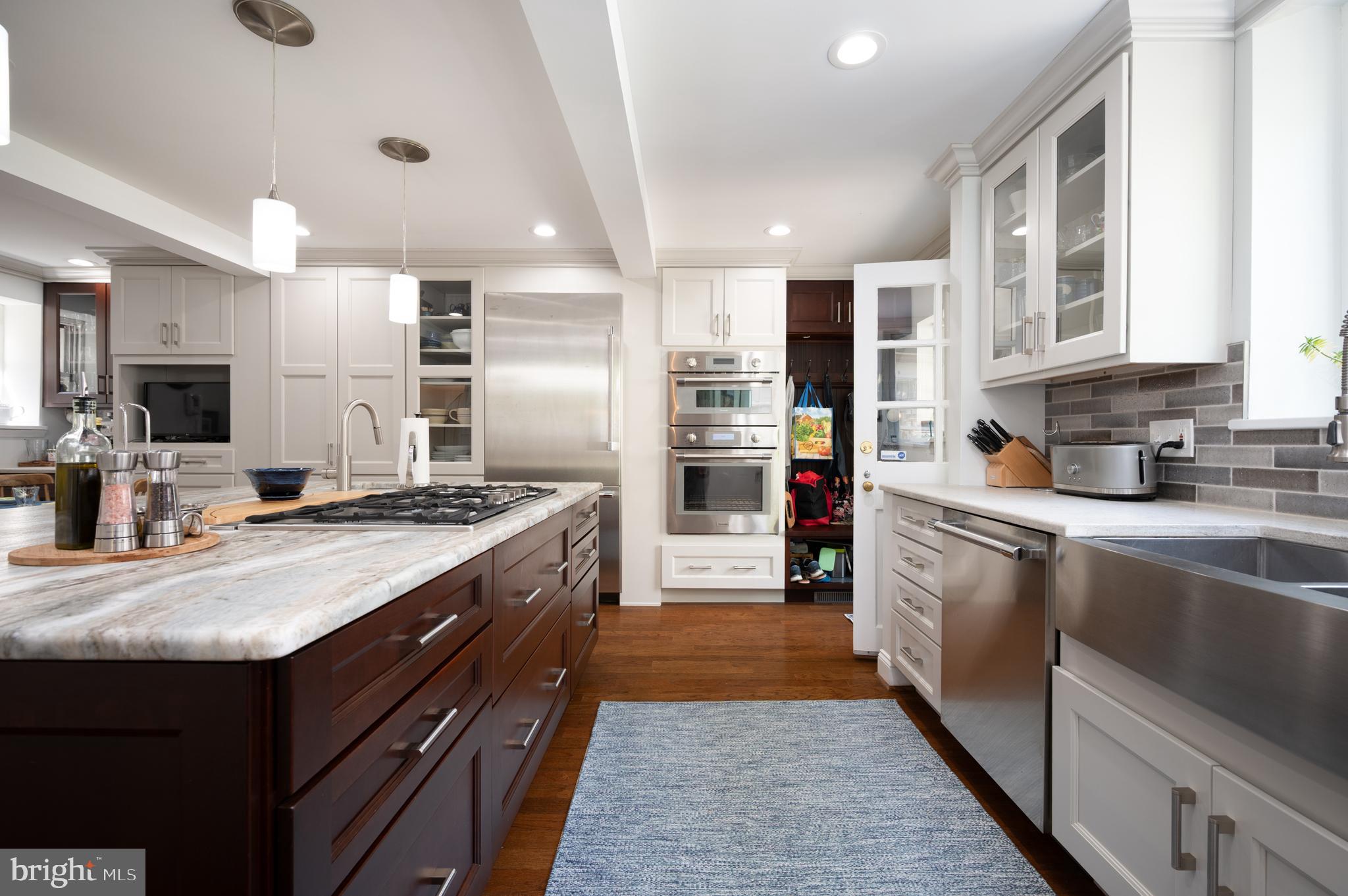 907 Overbrook Road Wilmington, DE 19807 - Photo 6 of 25 a large kitchen with stainless steel appliances granite countertop a stove refrigerator and a sink
