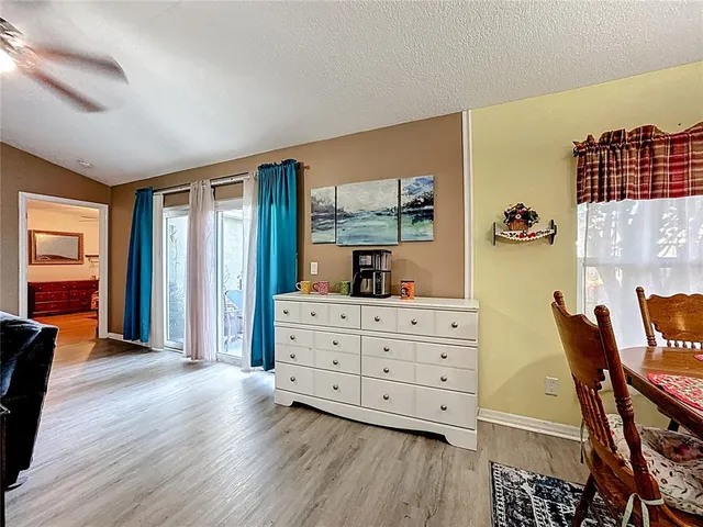 a bathroom with a sink toilet and mirror