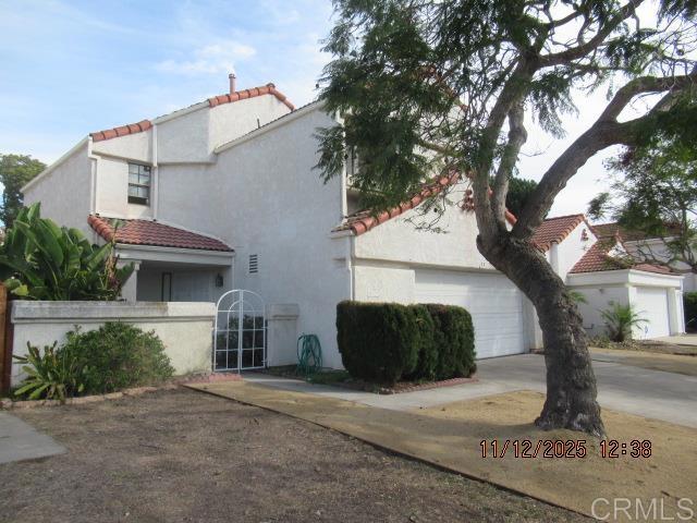 935 Redbud Road Chula Vista, CA 91910 - Photo 8 of 8 a house with a tree in front of it