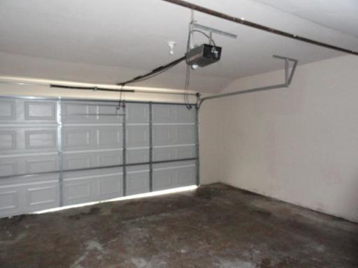 210 South Pinecrest Road Bolingbrook, IL 60440 - Photo 3 of 6 a view of a room with empty racks