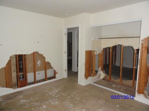 210 South Pinecrest Road Bolingbrook, IL 60440 - Photo 6 of 6 a view of a bedroom with wooden floor and windows