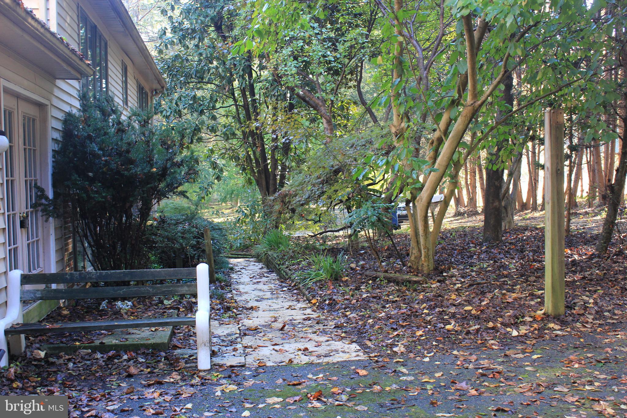 5510 Stephen Reid Road Huntingtown, MD 20639 - Photo 48 of 59 a view of a garden with trees