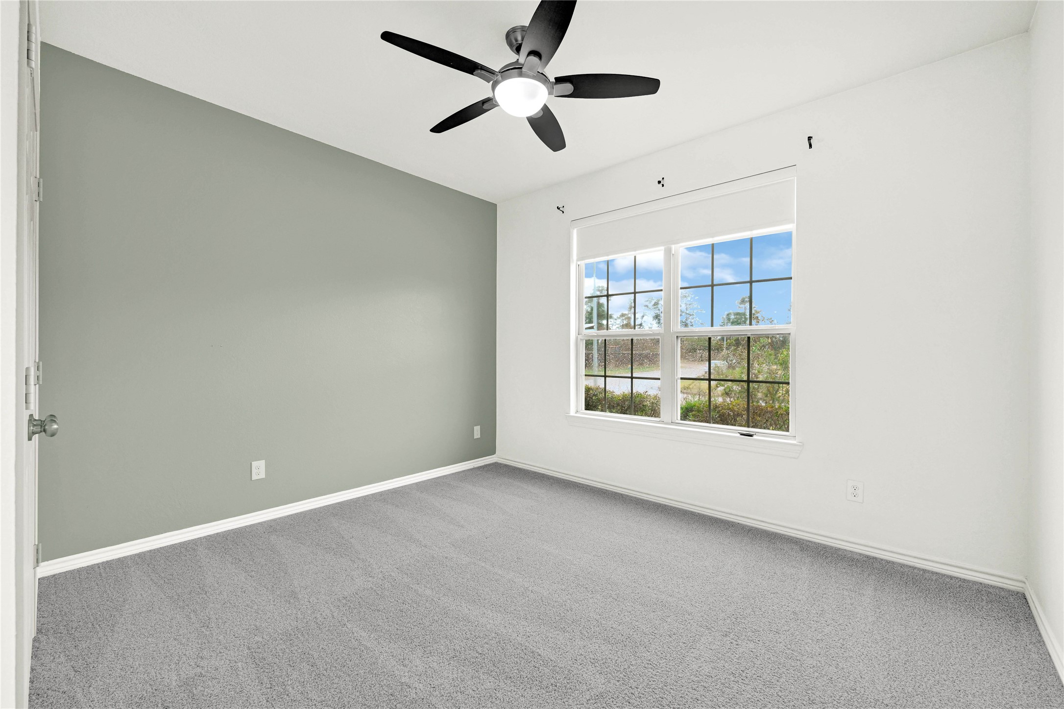 17802 Pepper Root Drive Spring, TX 77379 - Photo 16 of 34 a view of an empty room with a window