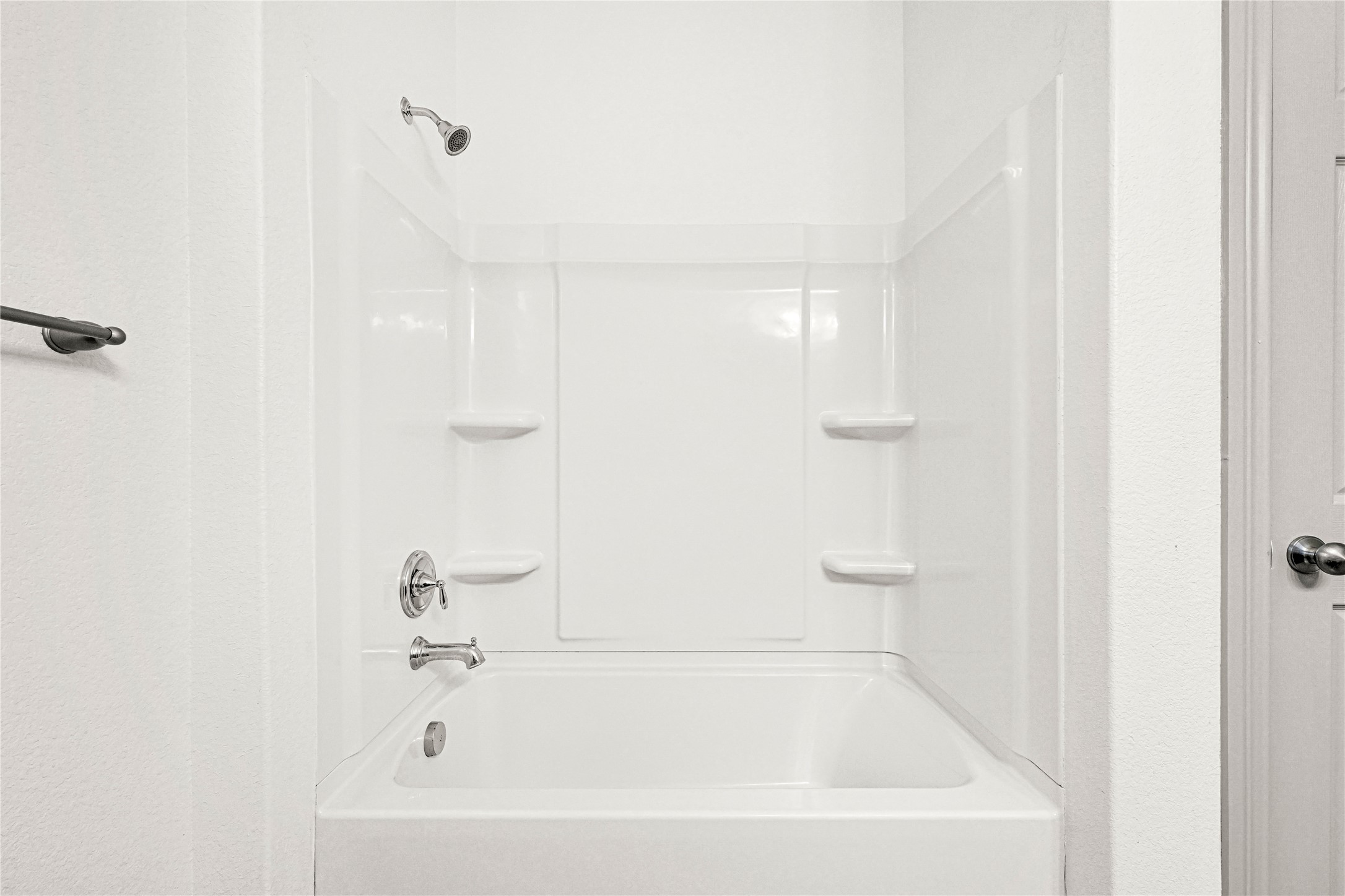 17802 Pepper Root Drive Spring, TX 77379 - Photo 20 of 34 a white bath tub sitting next to a white sink and vanity