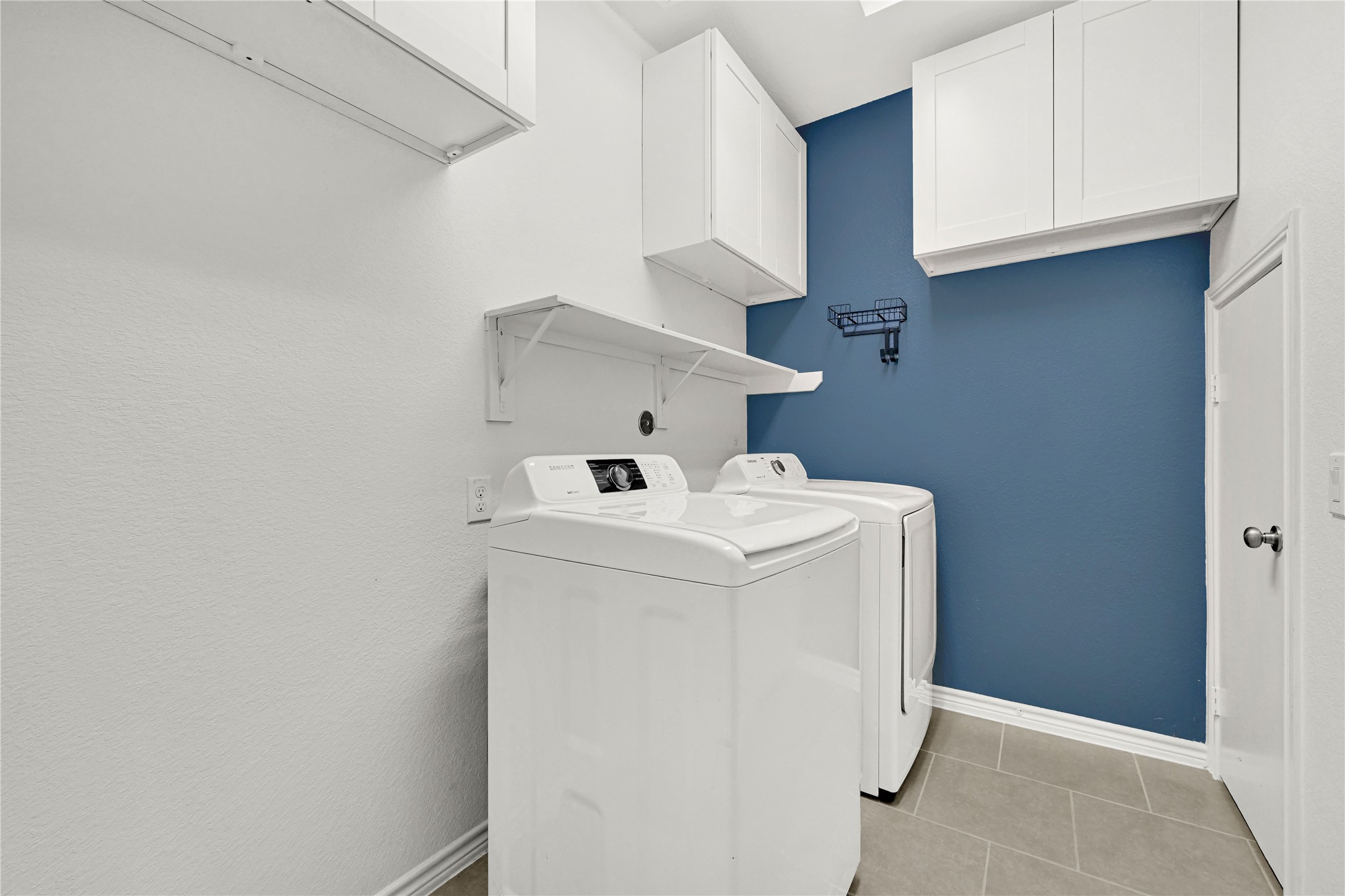 17802 Pepper Root Drive Spring, TX 77379 - Photo 22 of 34 1st floor laundry room with custom
cabinets - washer and dryer included!