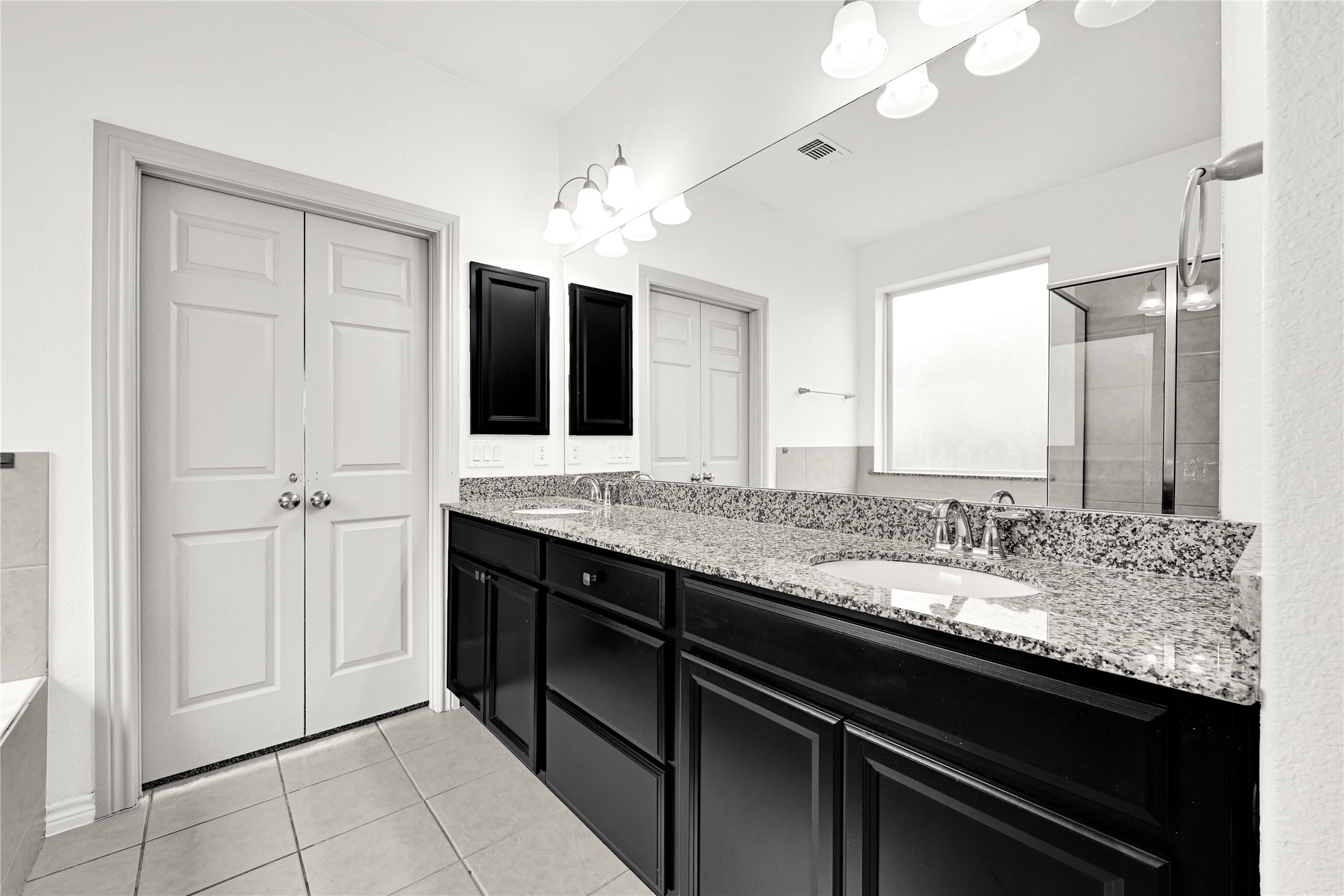 17802 Pepper Root Drive Spring, TX 77379 - Photo 26 of 34 a bathroom with a granite countertop sink and a mirror