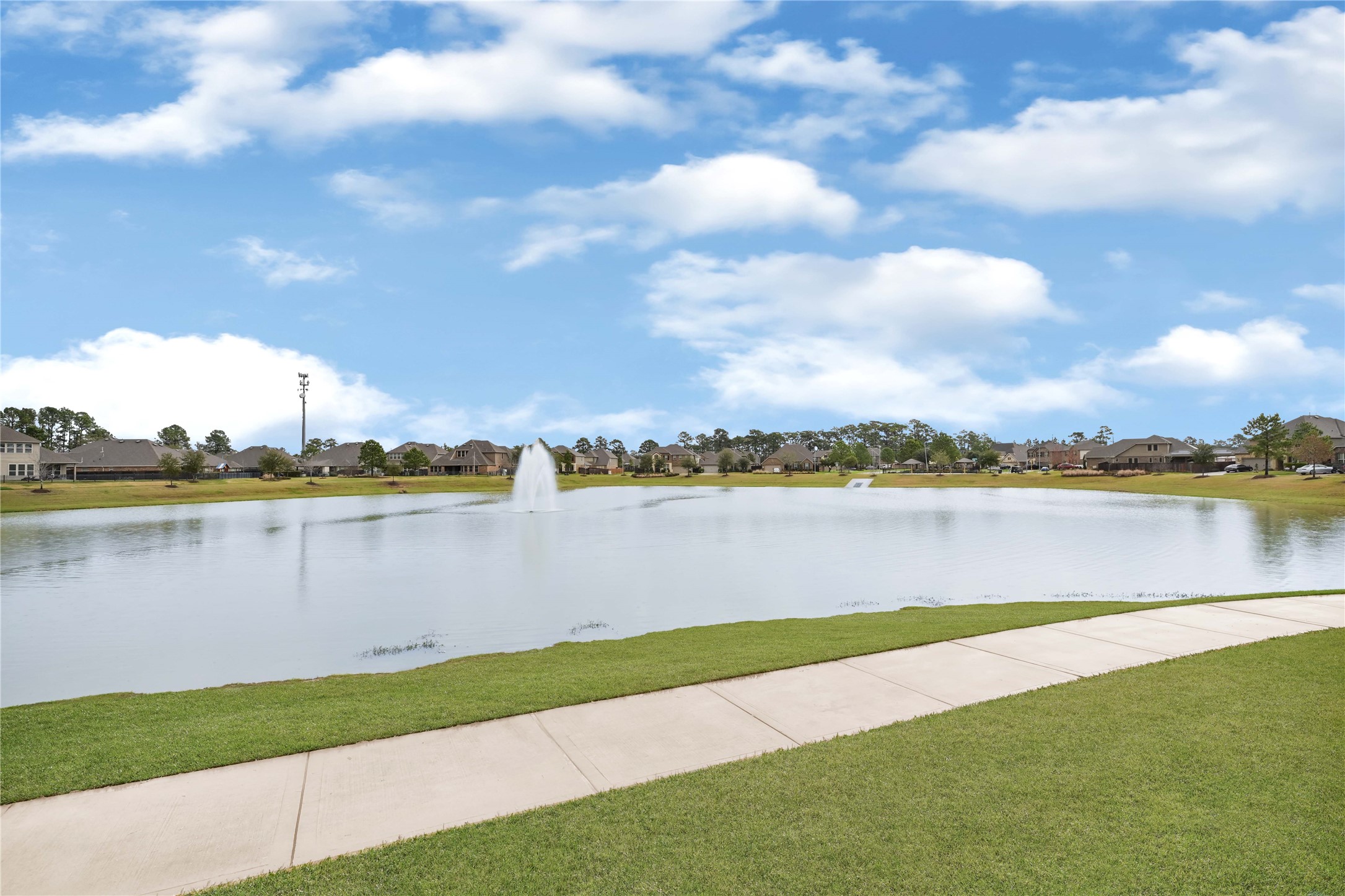 17802 Pepper Root Drive Spring, TX 77379 - Photo 6 of 34 a view of a lake with a city