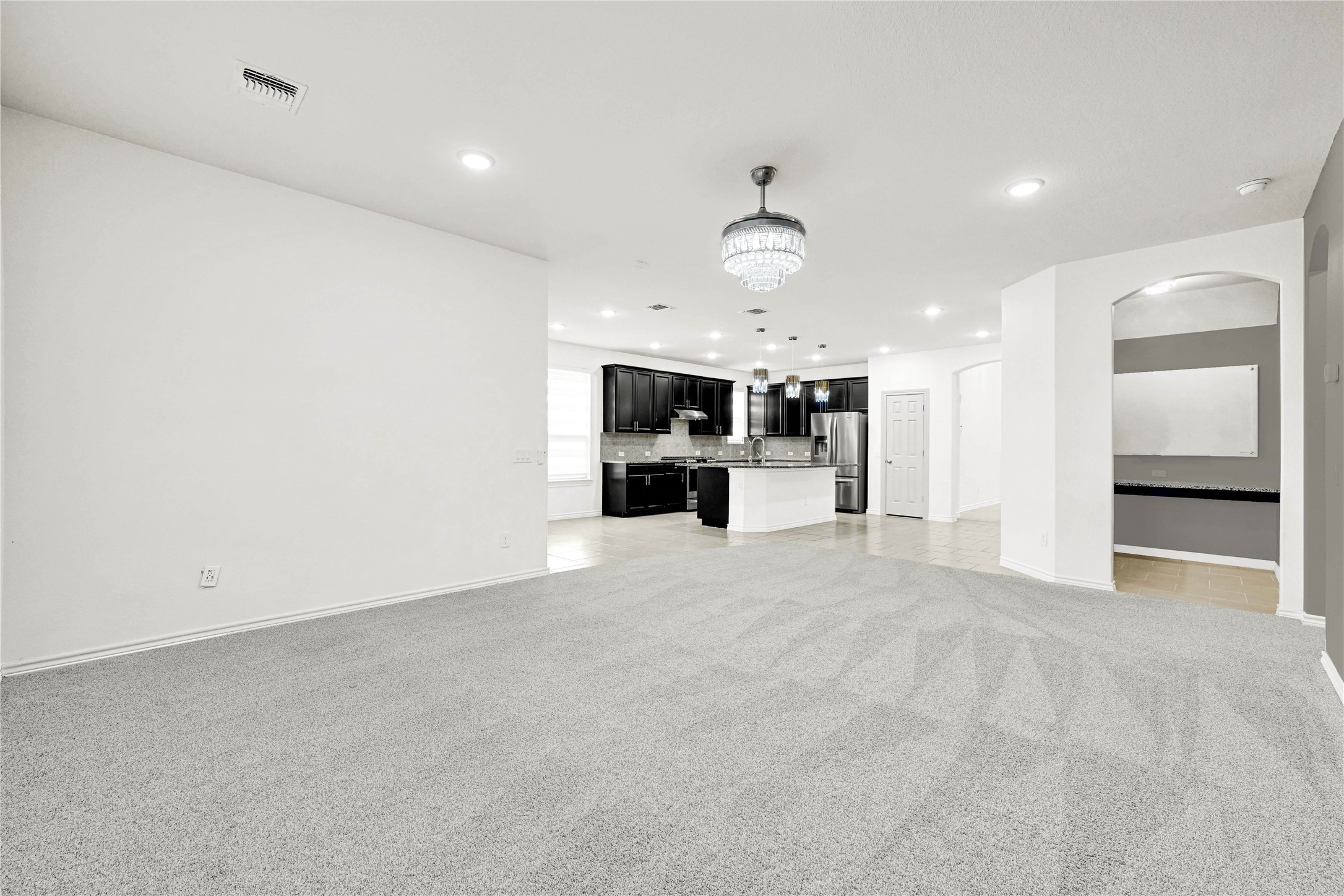 17802 Pepper Root Drive Spring, TX 77379 - Photo 10 of 34 a view of a kitchen with a sink and a window