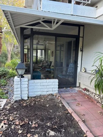 a view of a bench in the patio