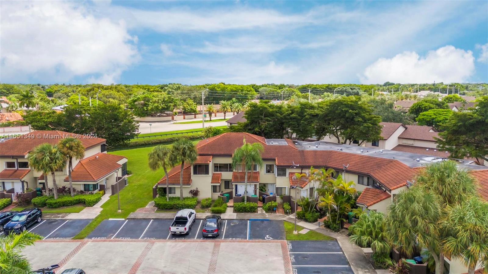 9823 Southwest 138th Avenue, Unit FC2L Miami, FL 33186 - Photo 19 of 28 an aerial view of a house with a garden and a yard