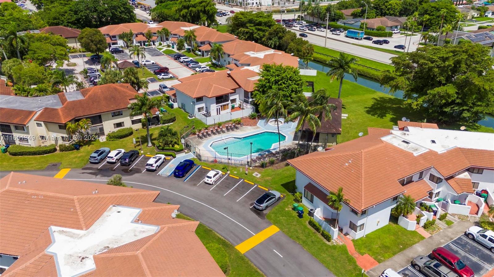 9823 Southwest 138th Avenue, Unit FC2L Miami, FL 33186 - Photo 24 of 28 an aerial view of residential houses with outdoor space