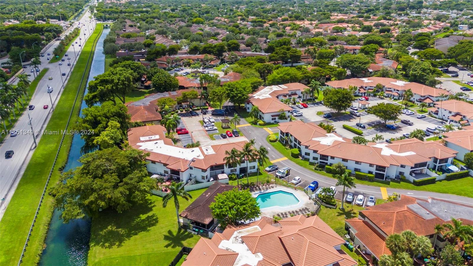 9823 Southwest 138th Avenue, Unit FC2L Miami, FL 33186 - Photo 27 of 28 an aerial view of residential houses with outdoor space