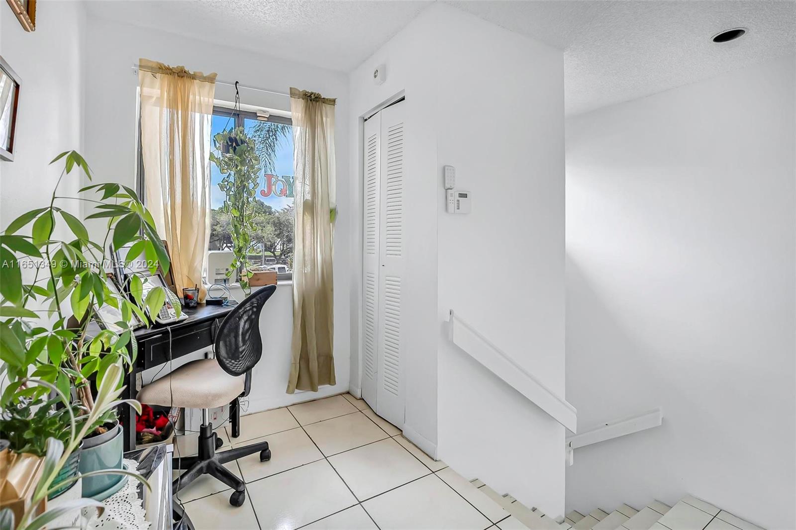 9823 Southwest 138th Avenue, Unit FC2L Miami, FL 33186 - Photo 8 of 28 a view of a workspace