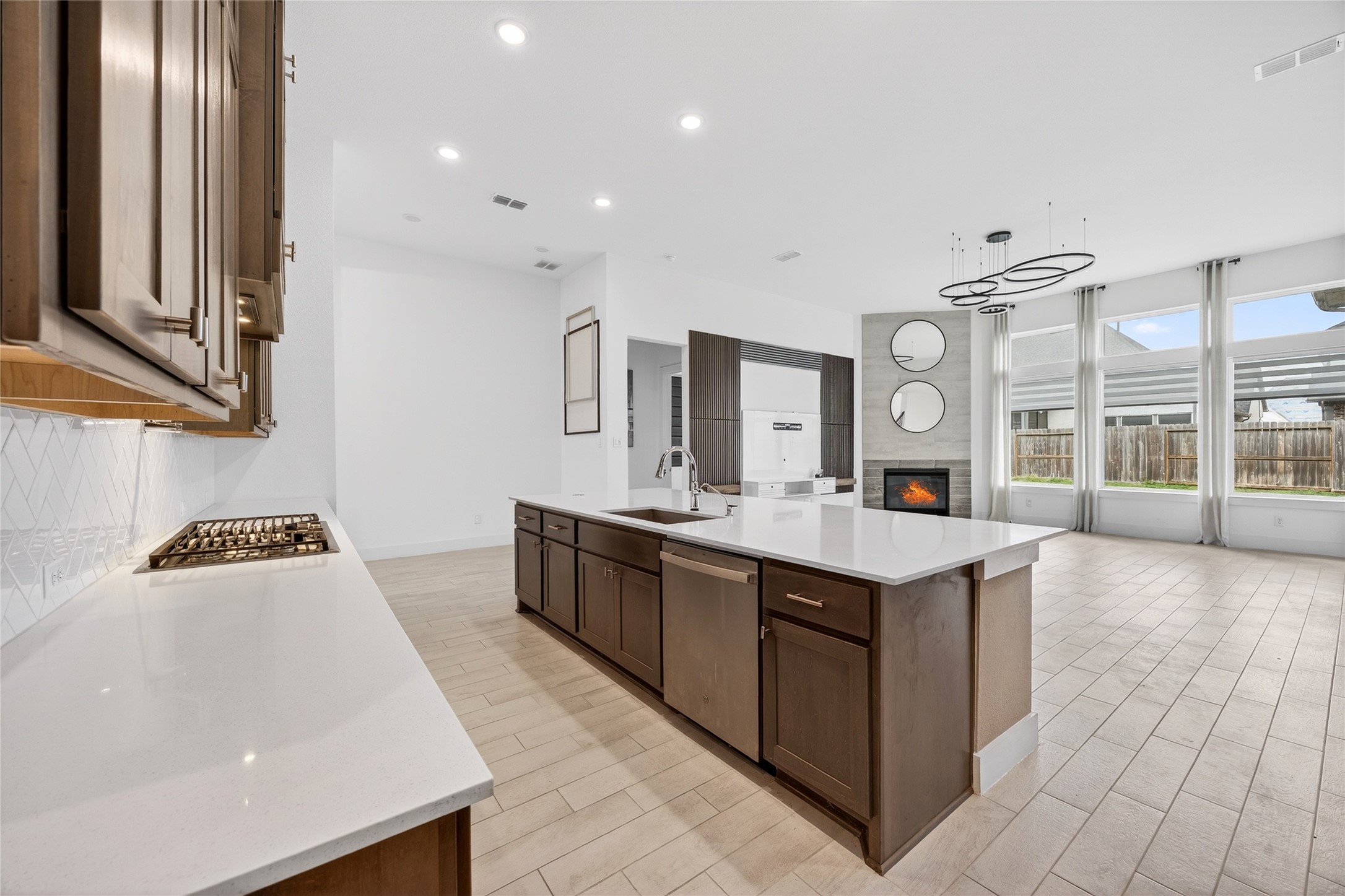 32018 Crested Knl Court Fulshear, TX 77441 - Photo 14 of 50 a large kitchen with stainless steel appliances a sink stove and cabinets