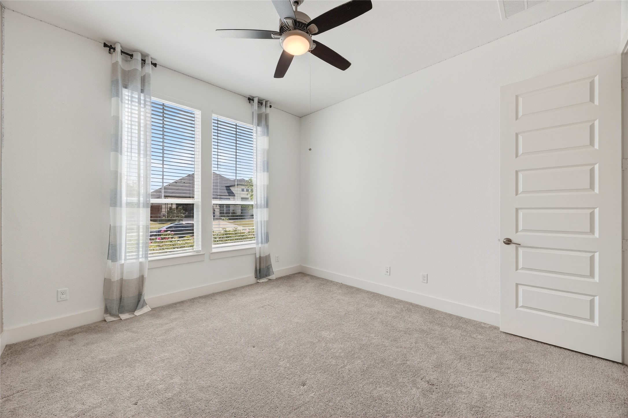 32018 Crested Knl Court Fulshear, TX 77441 - Photo 33 of 50 an empty room with a empty space and windows
