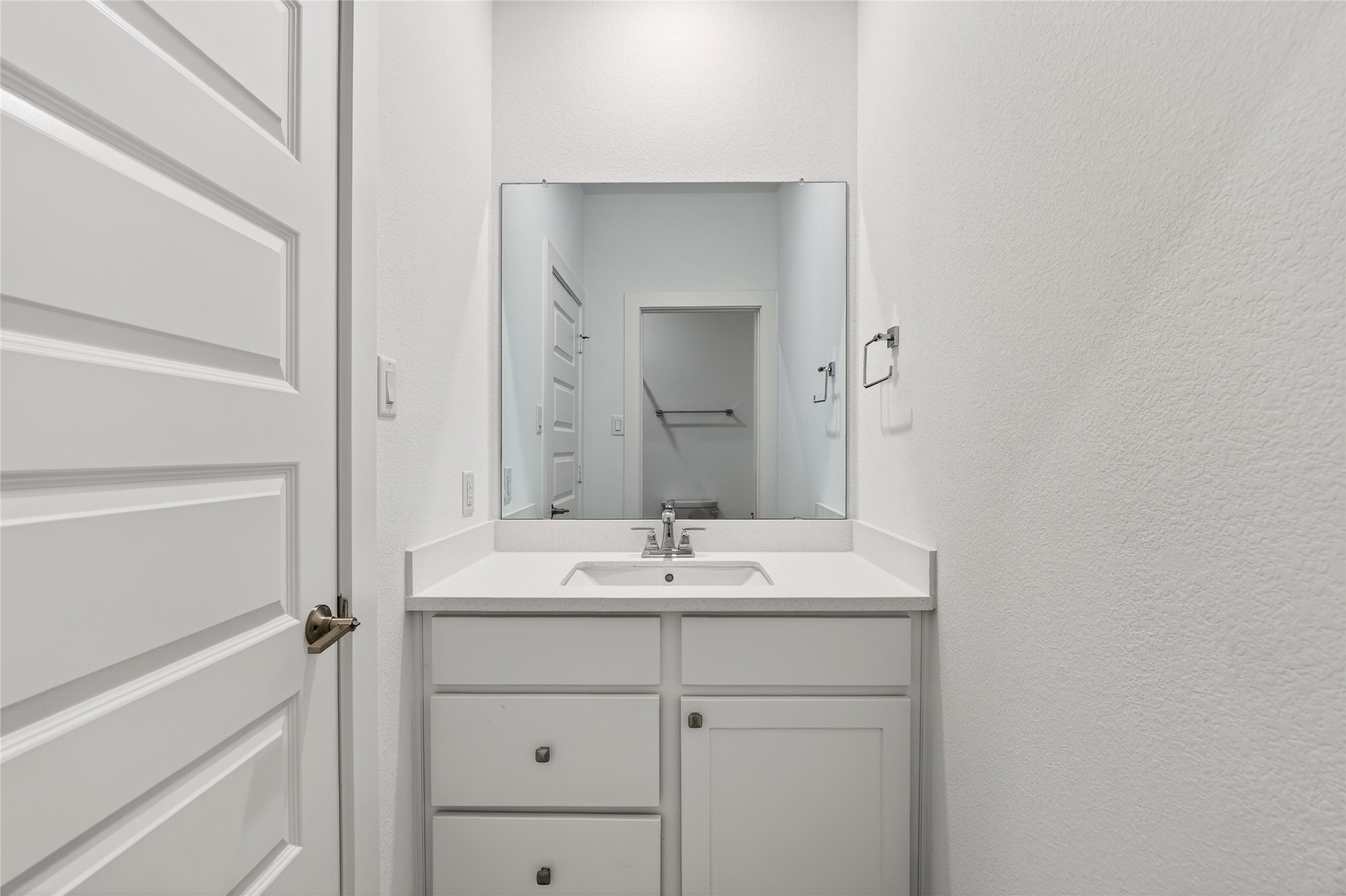 32018 Crested Knl Court Fulshear, TX 77441 - Photo 35 of 50 a bathroom with a sink and a mirror