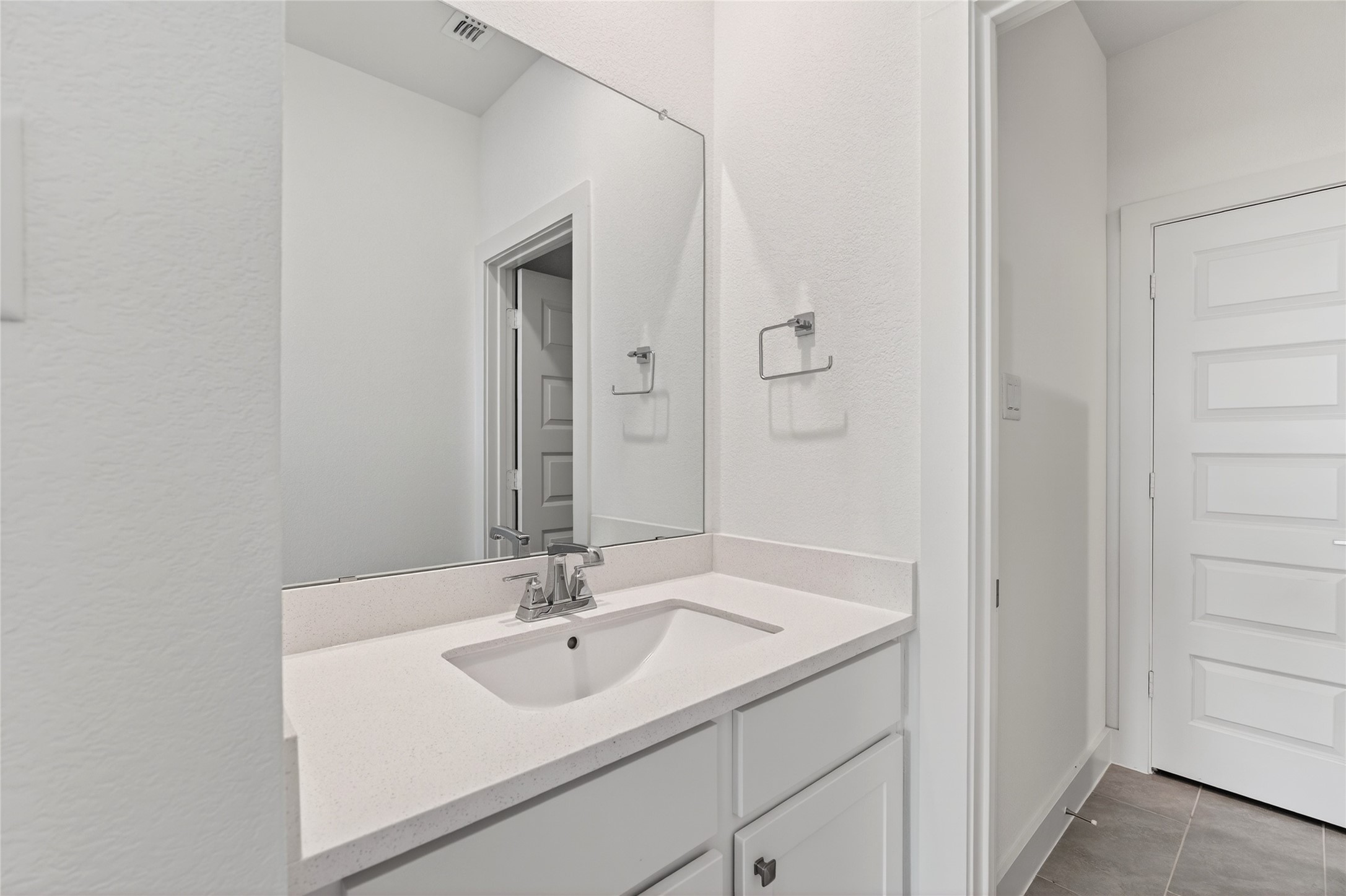 32018 Crested Knl Court Fulshear, TX 77441 - Photo 37 of 50 a bathroom with a sink and a mirror