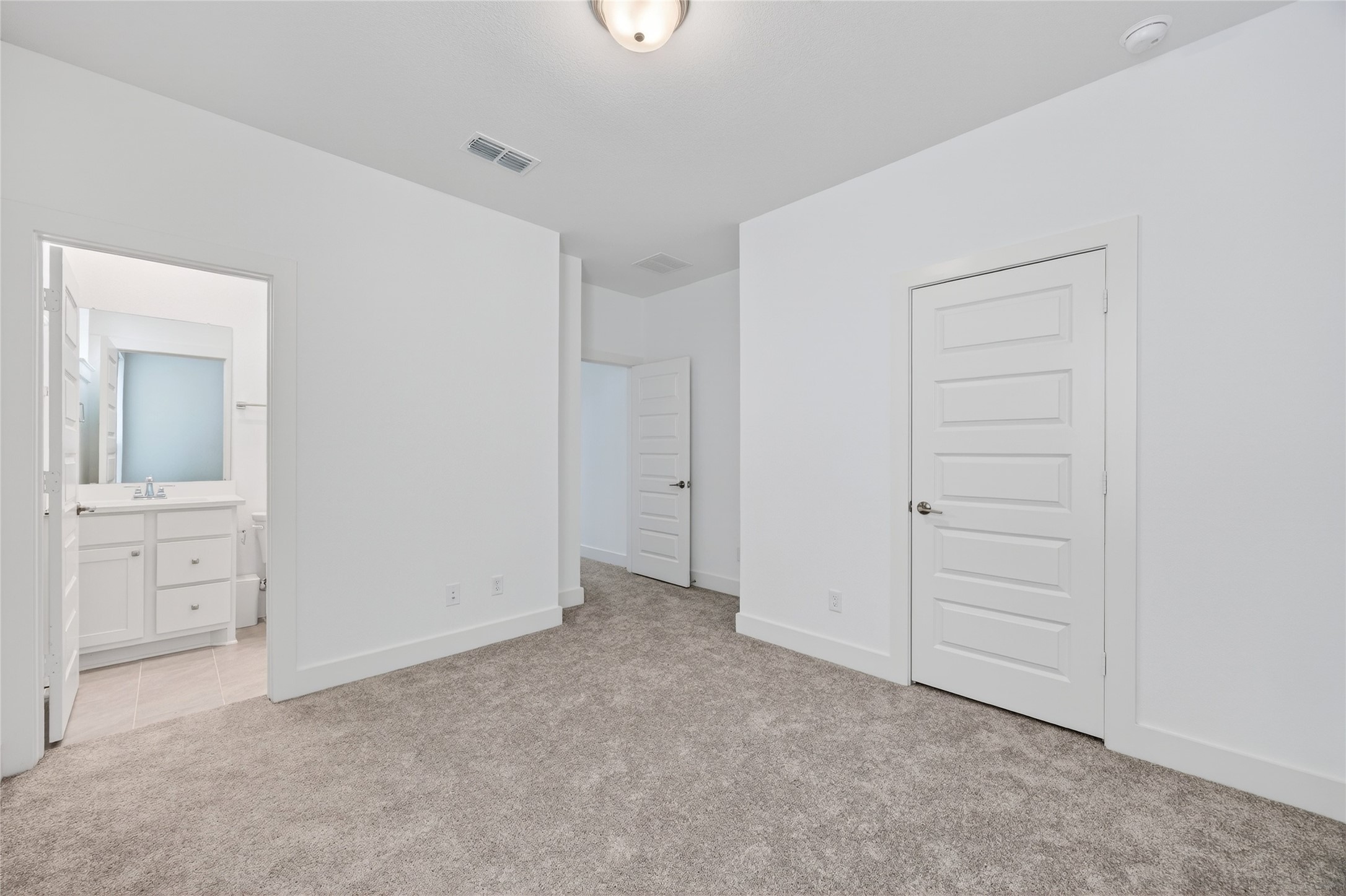 32018 Crested Knl Court Fulshear, TX 77441 - Photo 42 of 50 an empty room with closet and mirror