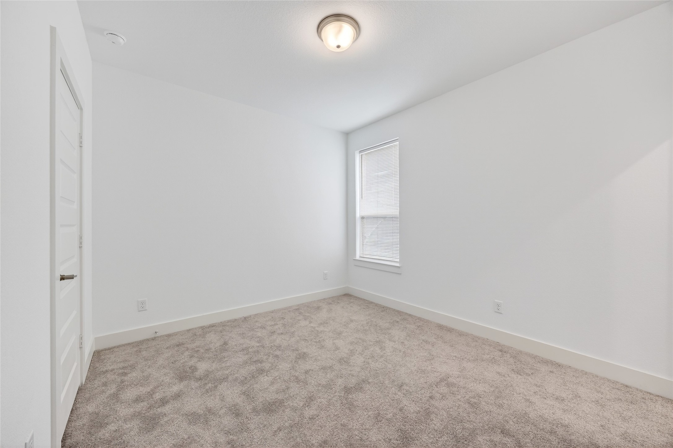 32018 Crested Knl Court Fulshear, TX 77441 - Photo 43 of 50 an empty room with a empty space and window