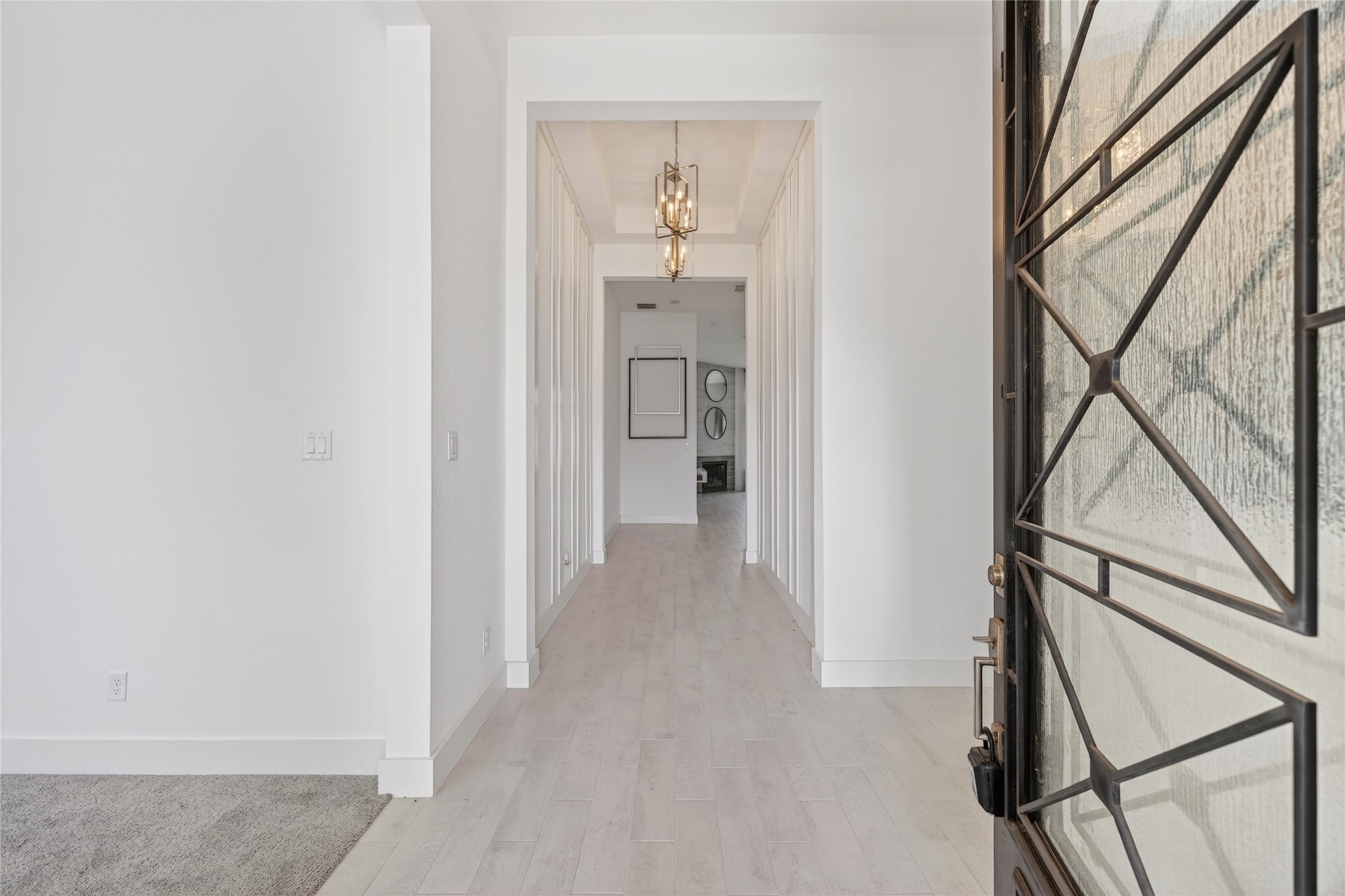 32018 Crested Knl Court Fulshear, TX 77441 - Photo 8 of 50 a view of an entryway with wooden floor