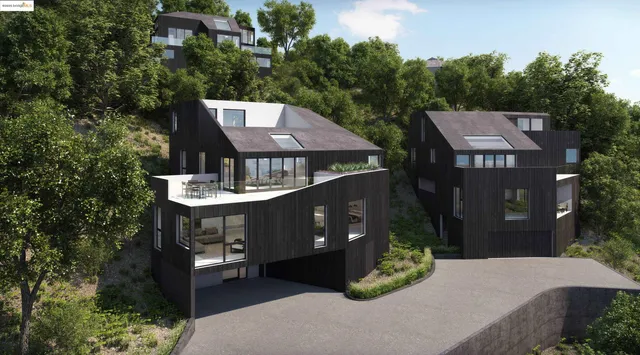 a aerial view of a house with a yard balcony