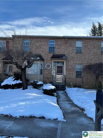 a view of a house with a patio