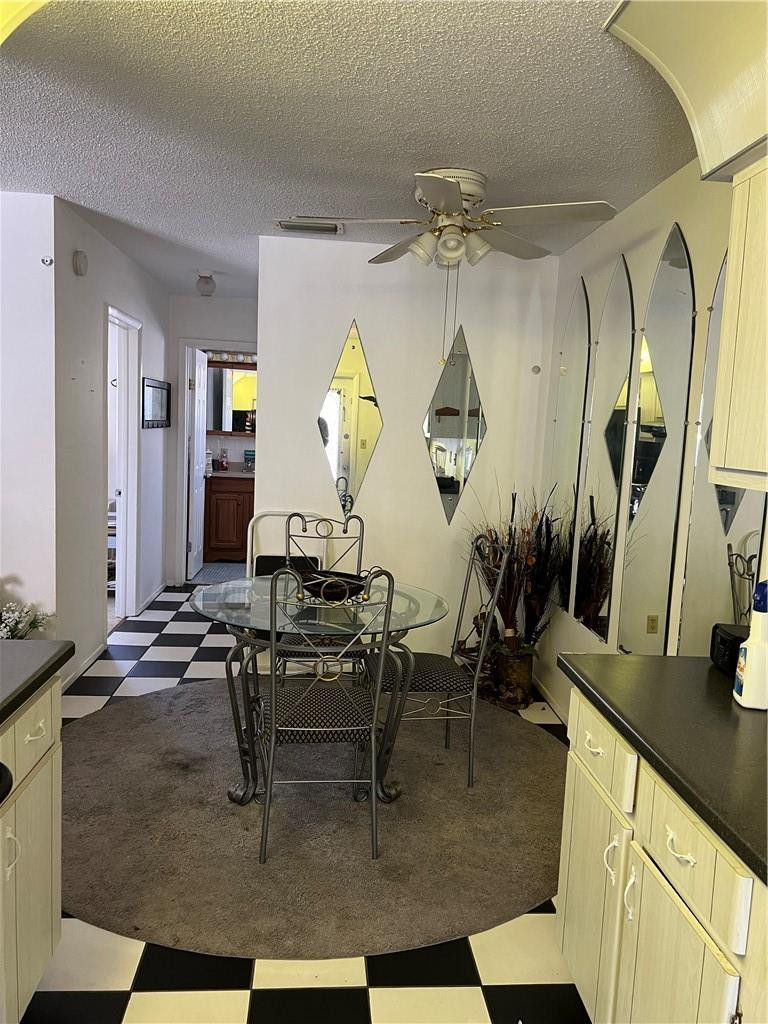 1833 Monroe Street, Unit 17 Hollywood, FL 33020 - Photo 3 of 9 a view of a dining room with furniture