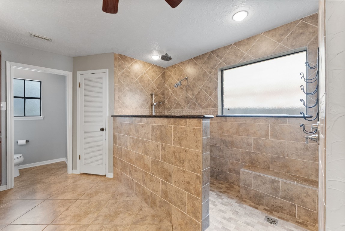 16927 Windypine Drive Spring, TX 77379 - Photo 20 of 46 a bathroom with a shower