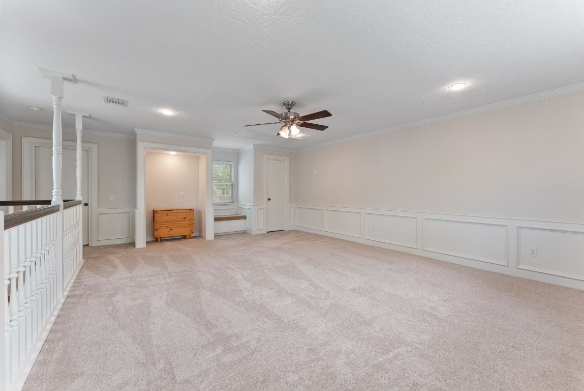 16927 Windypine Drive Spring, TX 77379 - Photo 21 of 46 a view of a livingroom with a ceiling fan and window
