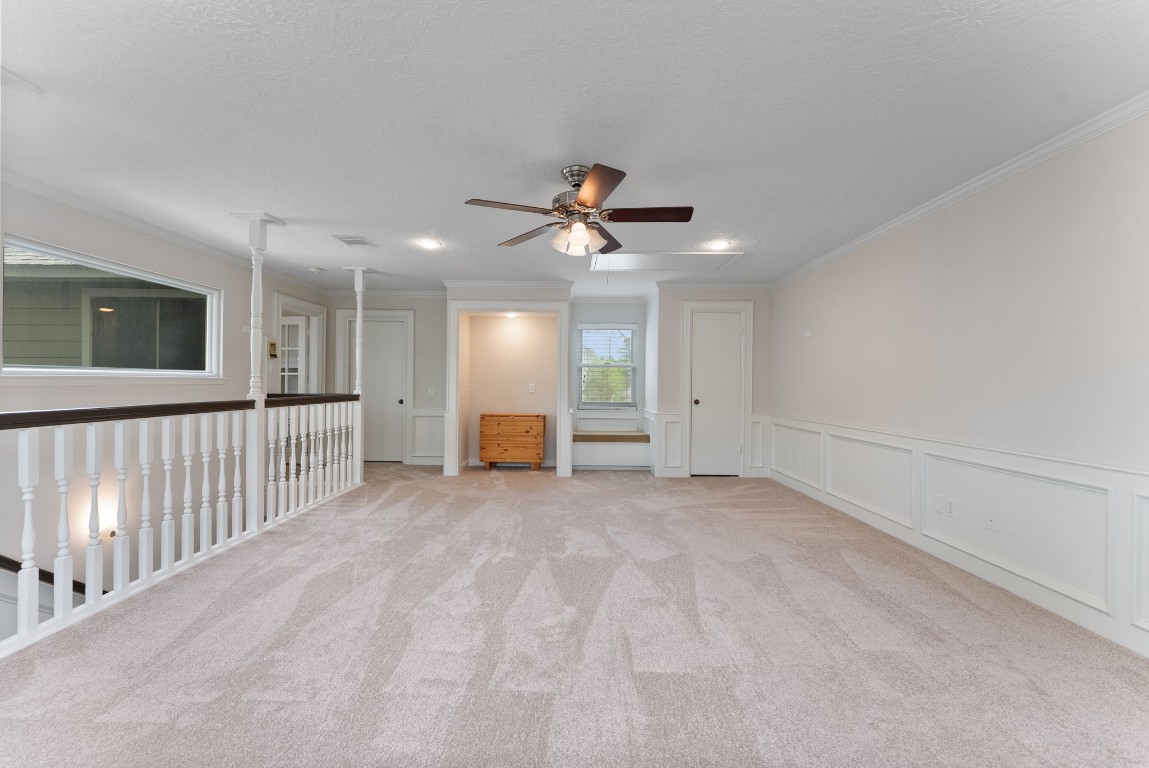 16927 Windypine Drive Spring, TX 77379 - Photo 22 of 46 a view of a livingroom with a ceiling fan and window